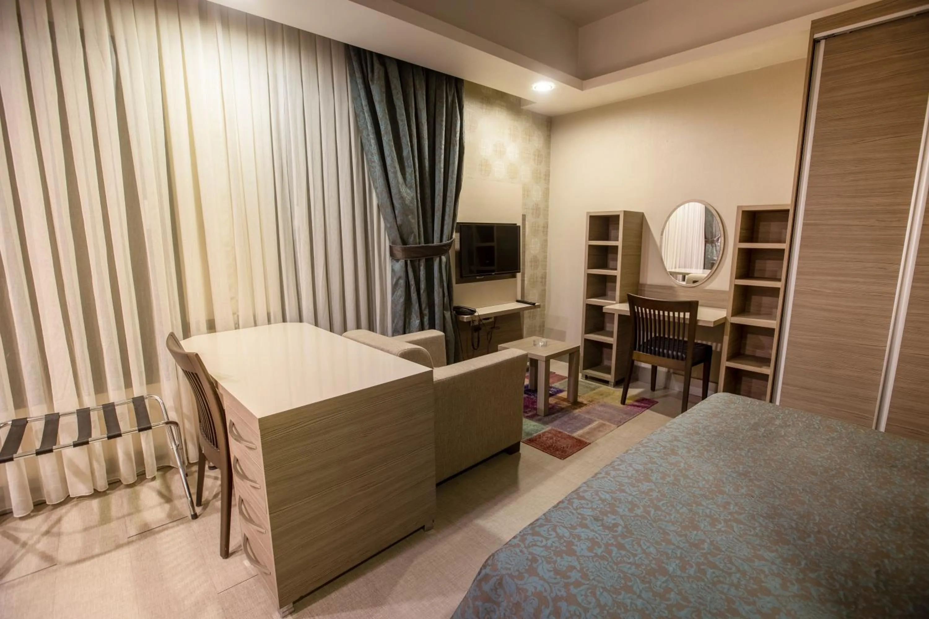 Seating area, Bed in Sen Otel