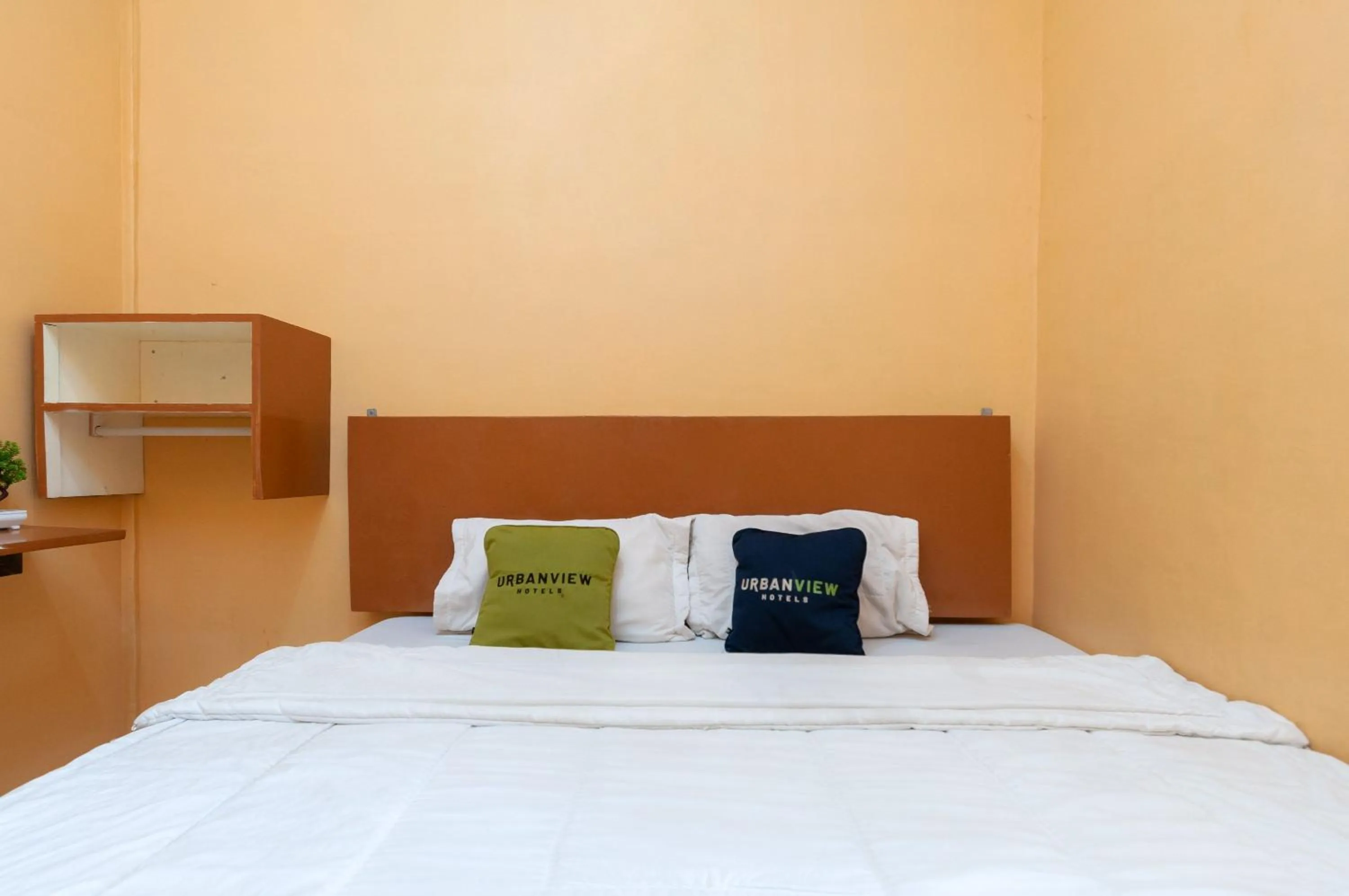 Bedroom, Bed in Urbanview Hotel Nisura Homestay Medan by RedDoorz