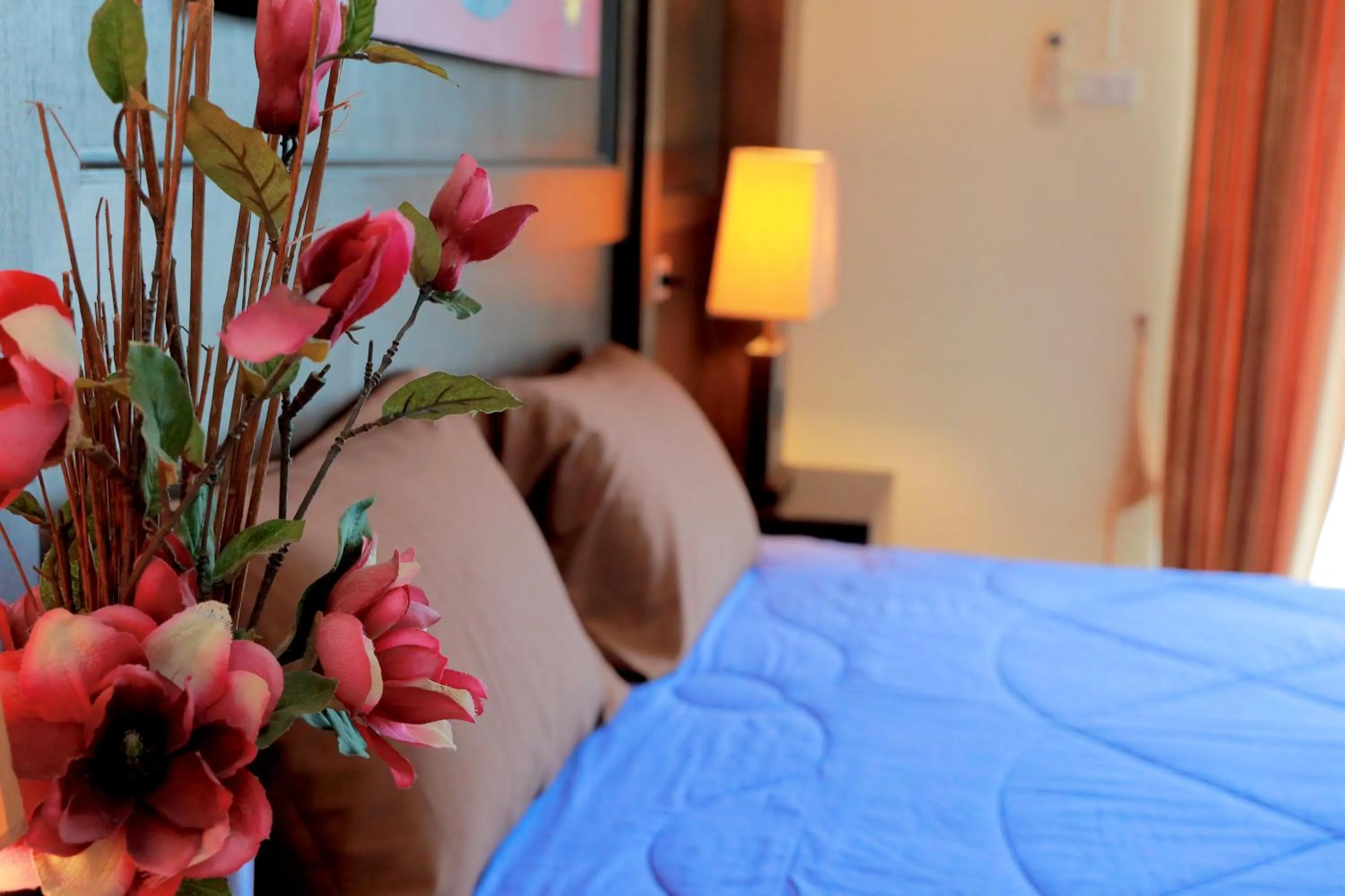 Bed in THOMLEK Guesthouse