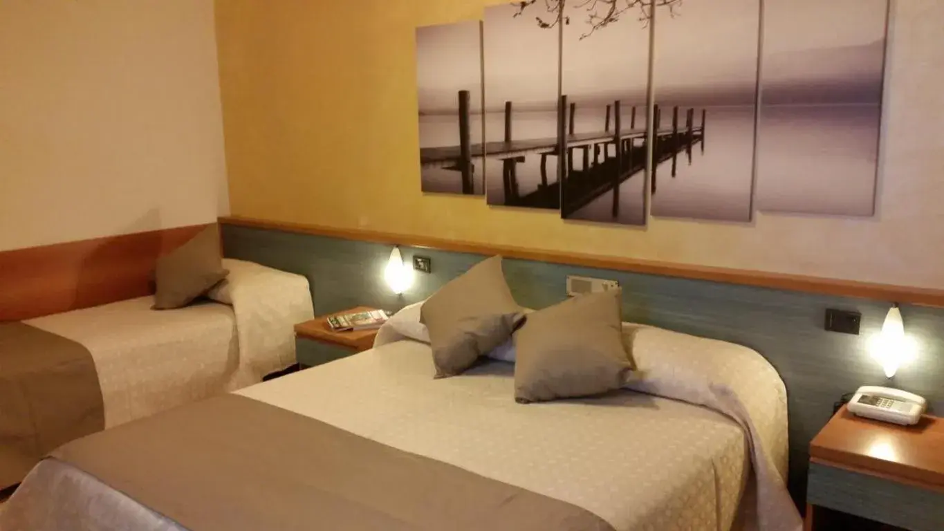 Quadruple Room in Albergo Al Cacciatore Quadruple Room in Albergo Al Cacciatore