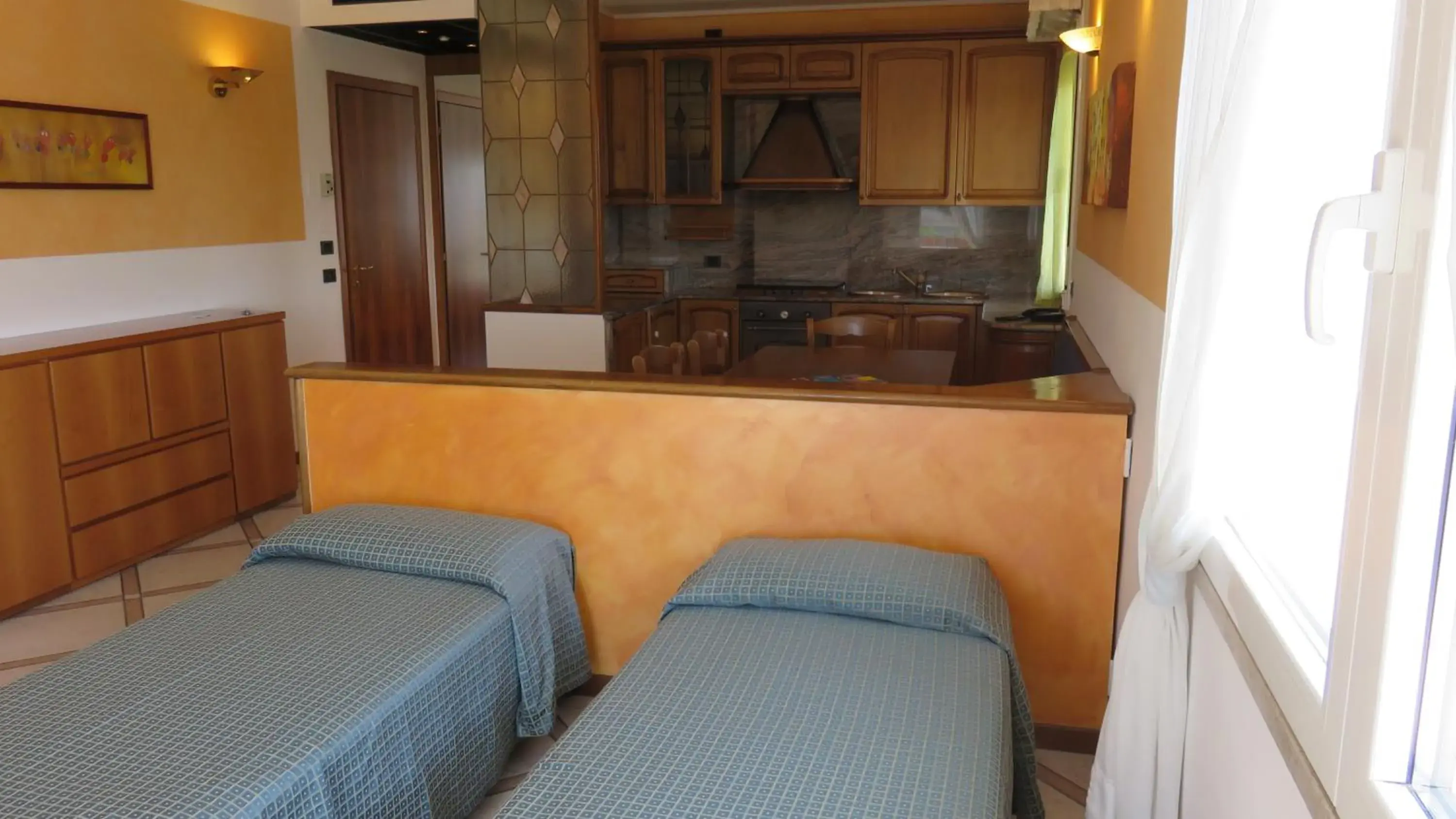 Family Room with Balcony in Albergo Al Cacciatore Family Room with Balcony in Albergo Al Cacciatore