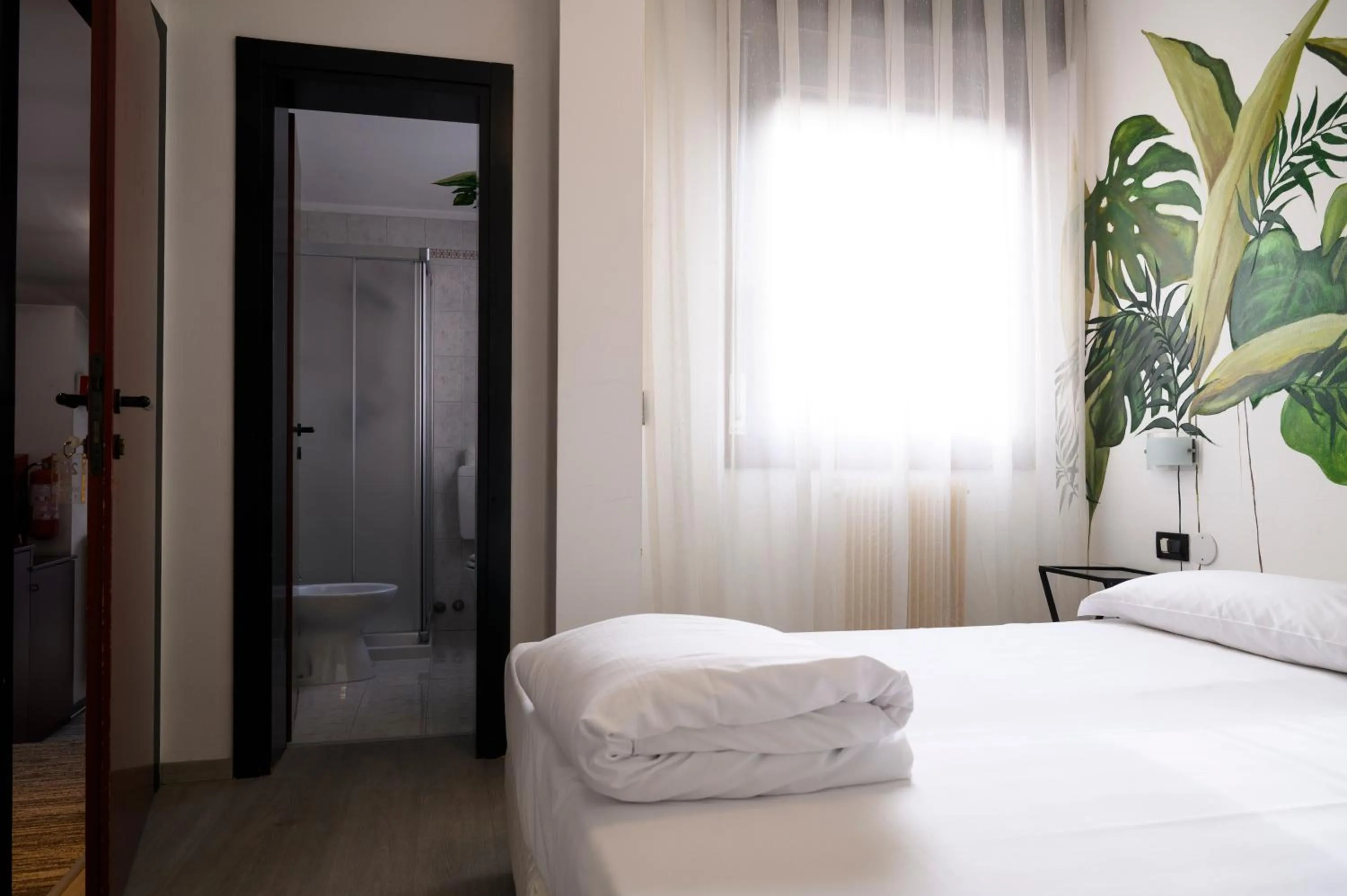 Bedroom in Hotel Due Ragni e Ristorante