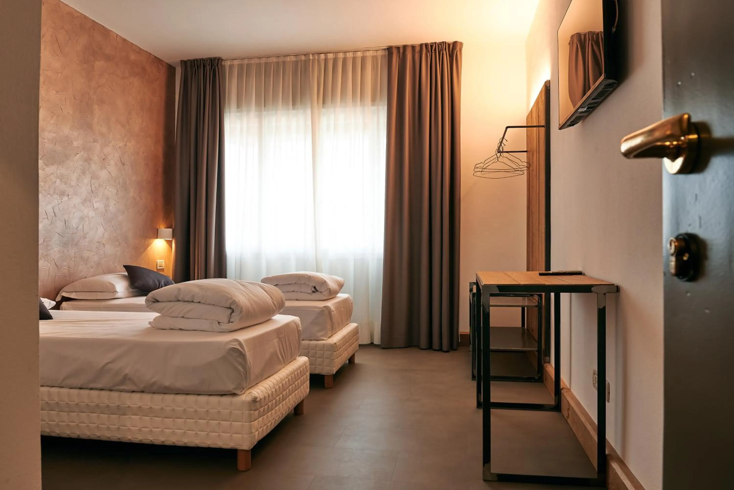 Bedroom in Hotel Due Ragni e Ristorante