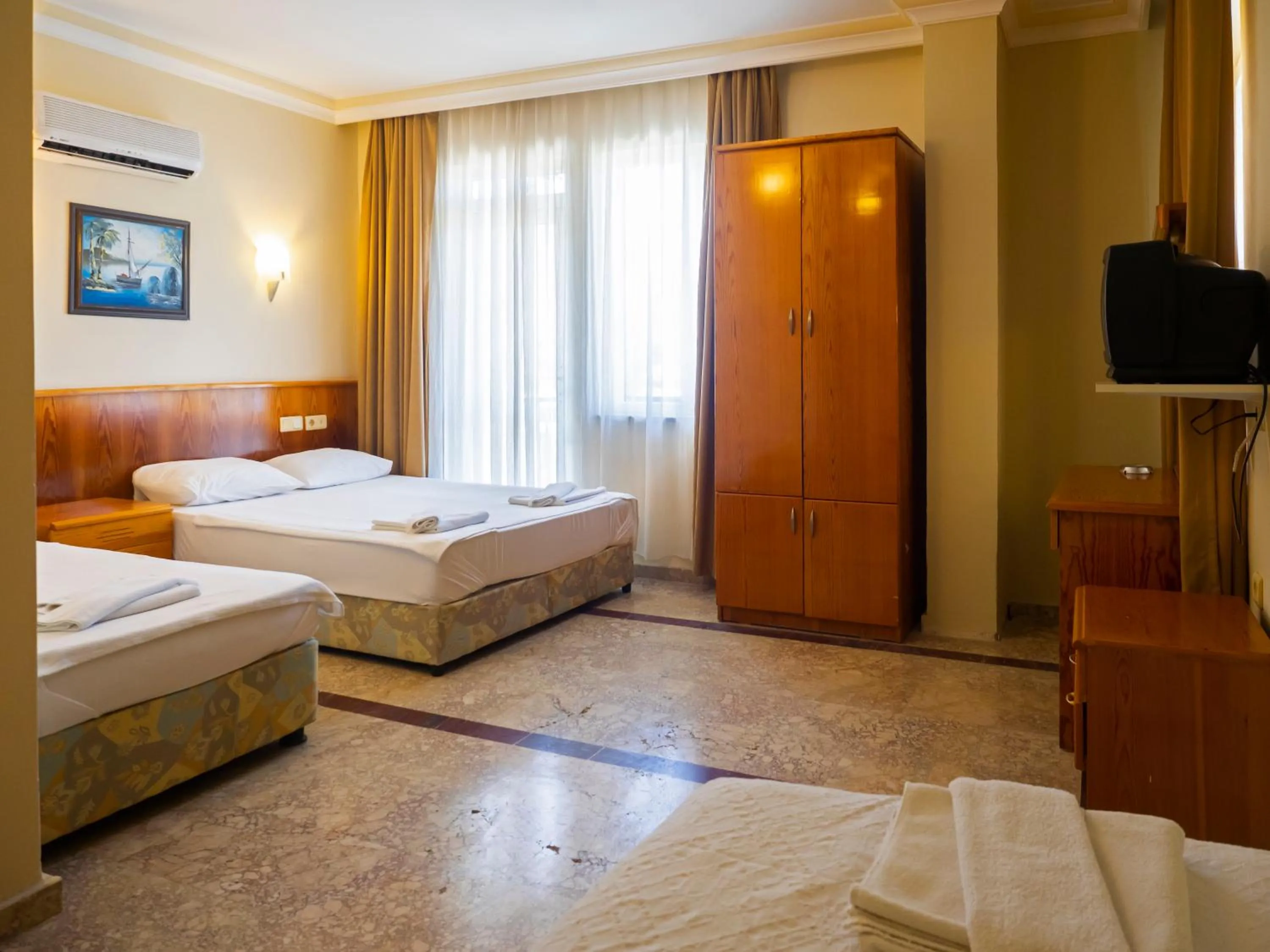 Bed in Tal Beach Hotel