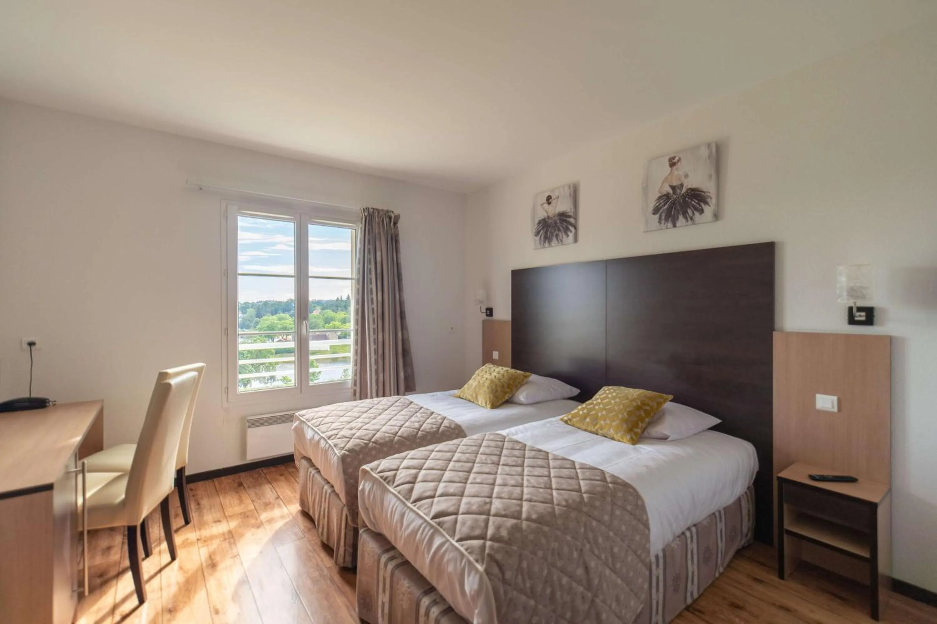 Bedroom, Bed in Brit Hotel Confort - La Tour Blanche