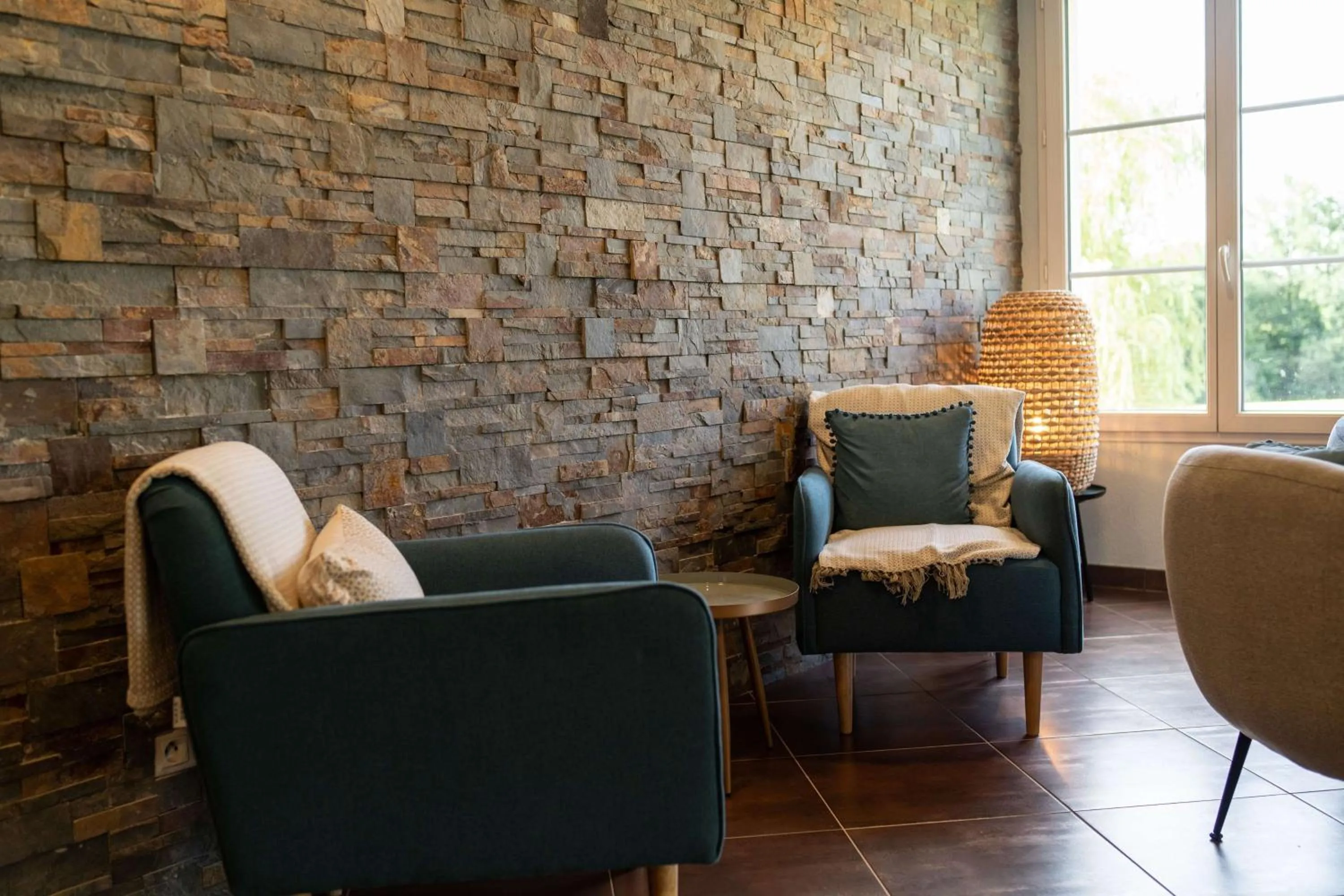 Lobby or reception in Brit Hotel Confort - La Tour Blanche