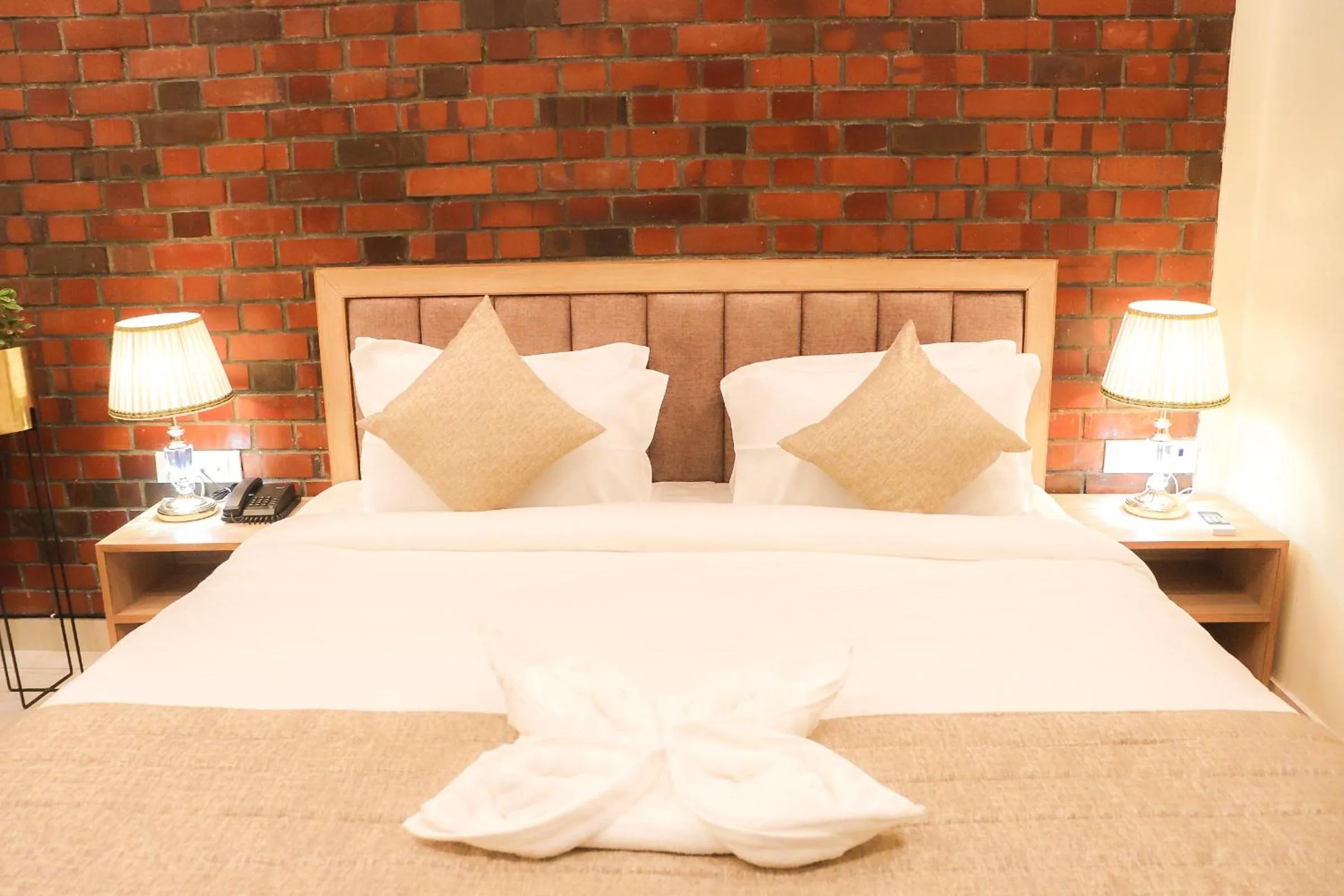 Bed in Hotel Royal Palm Dehradun