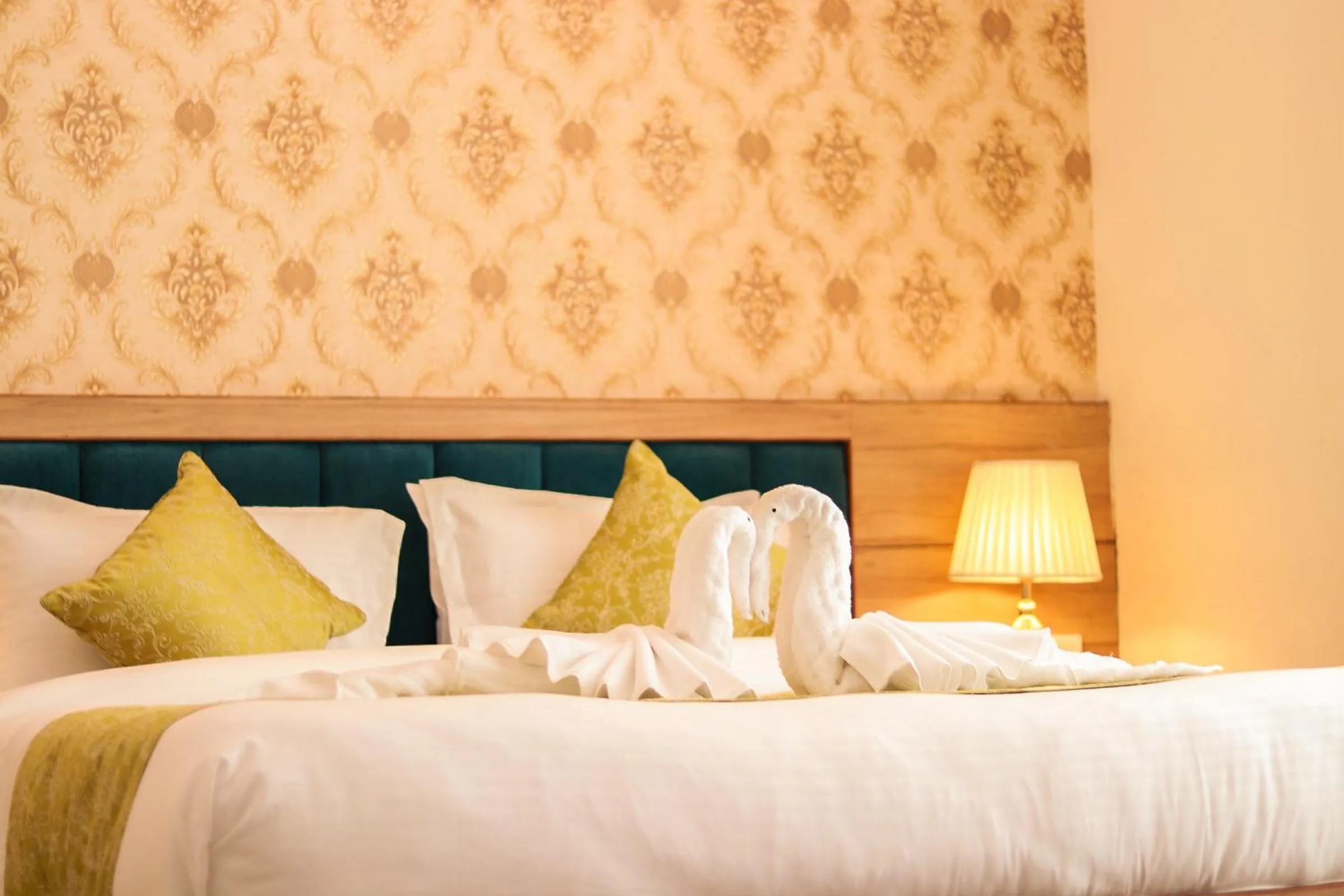 Bed in Hotel Royal Palm Dehradun