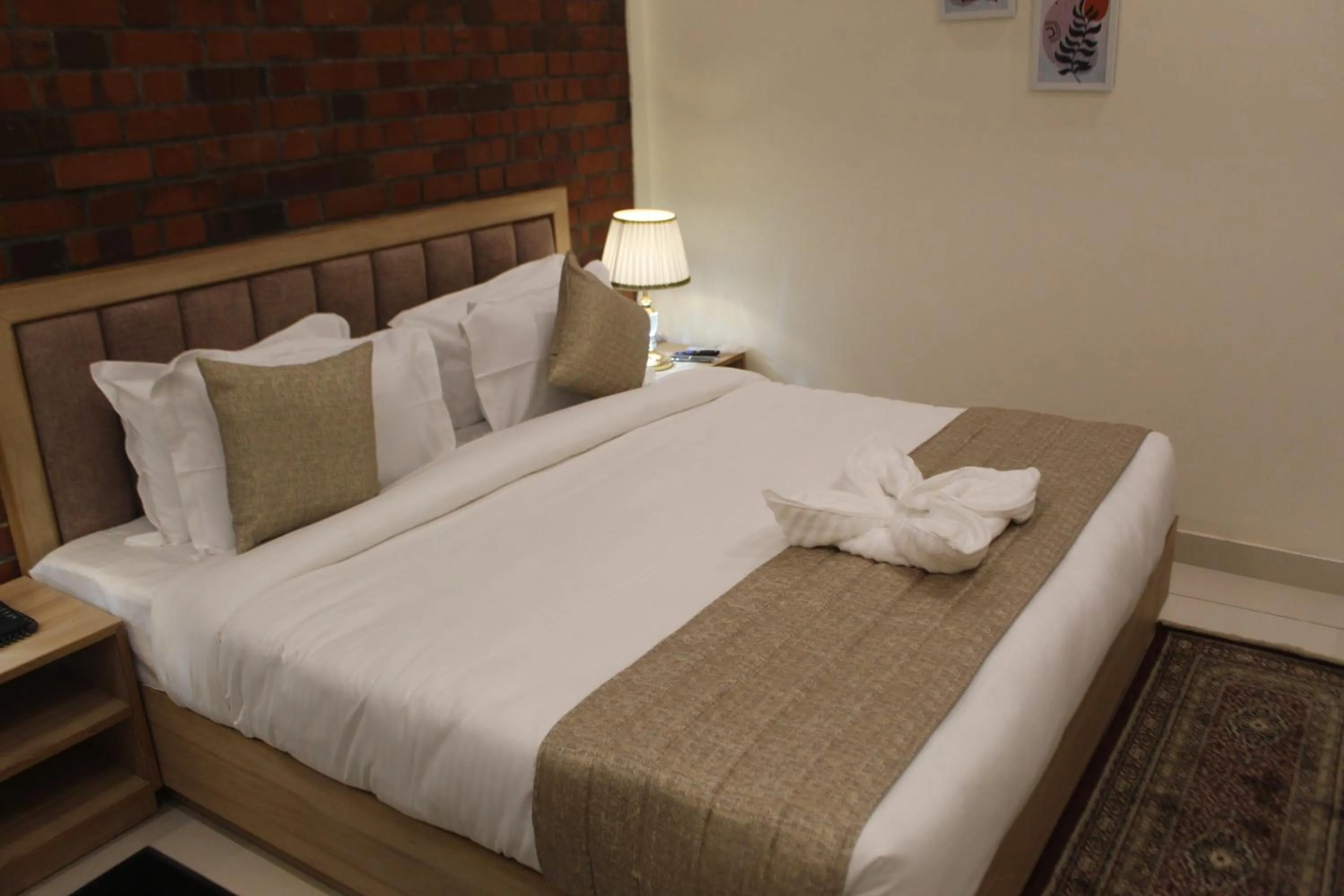 Bed in Hotel Royal Palm Dehradun