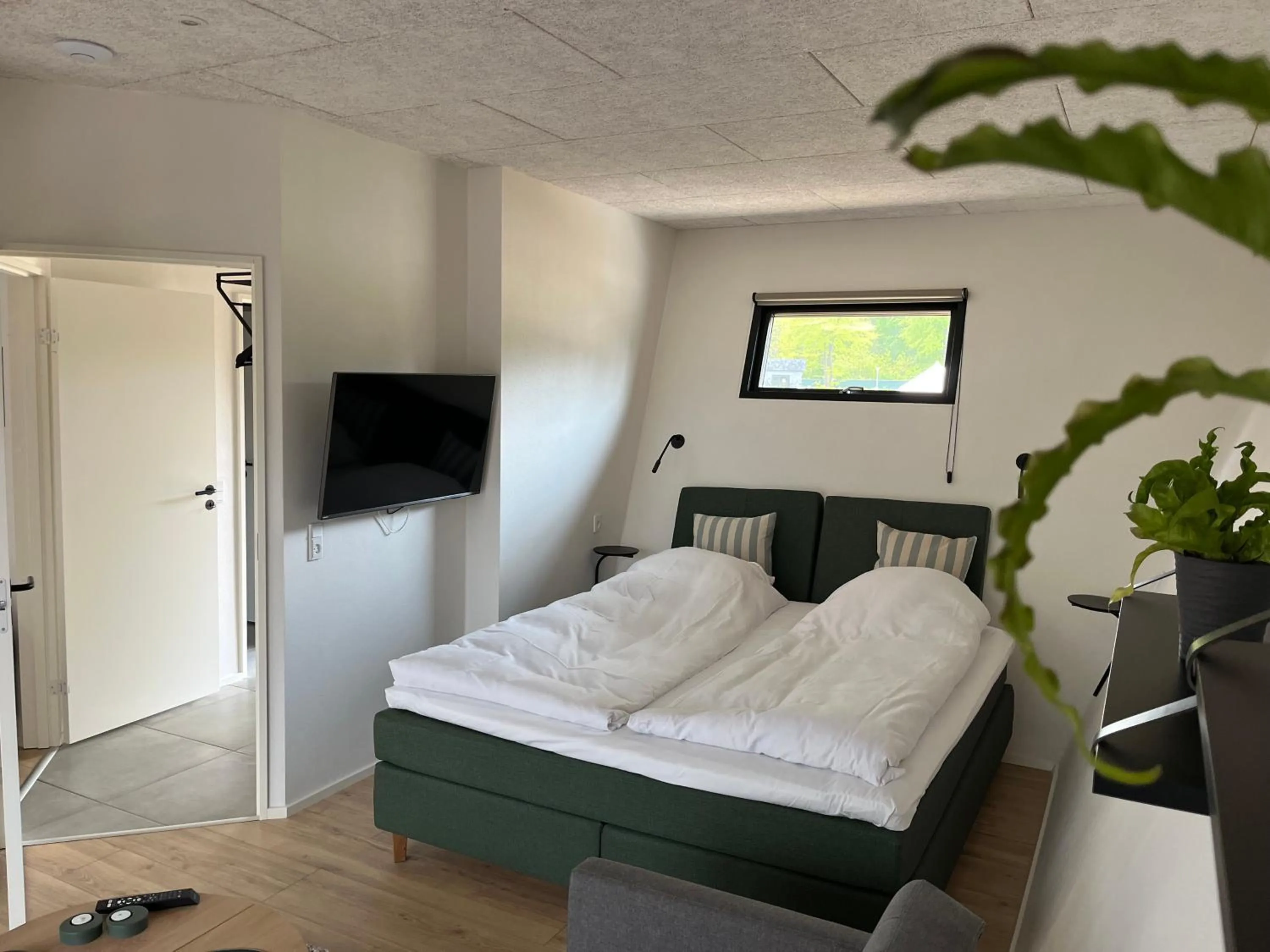 Bedroom, Bed in SØGAARDEN - Hotel & SøCamp