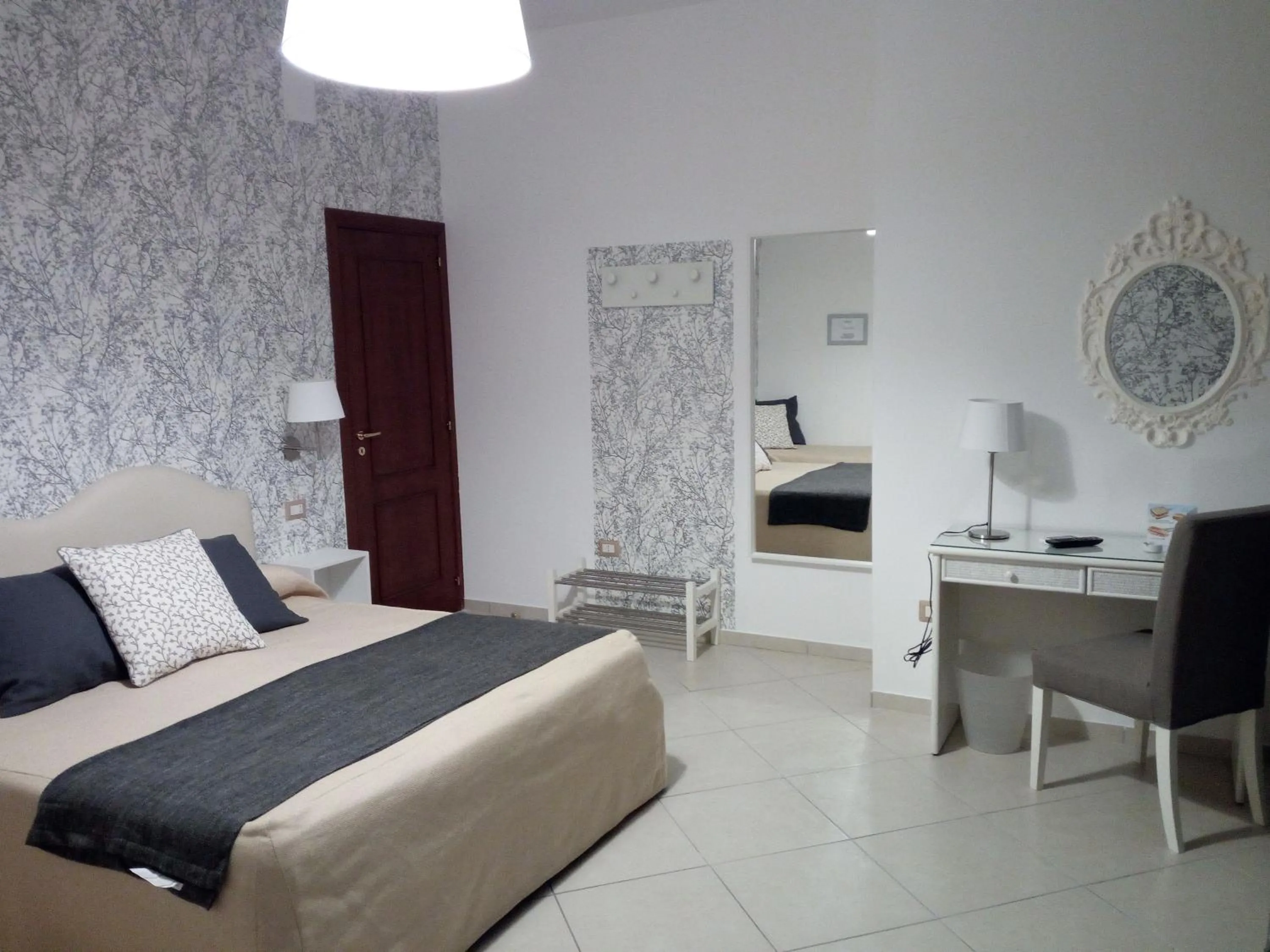 Photo of the whole room, Bed in Mini Hotel - Angolo Di Paradiso -