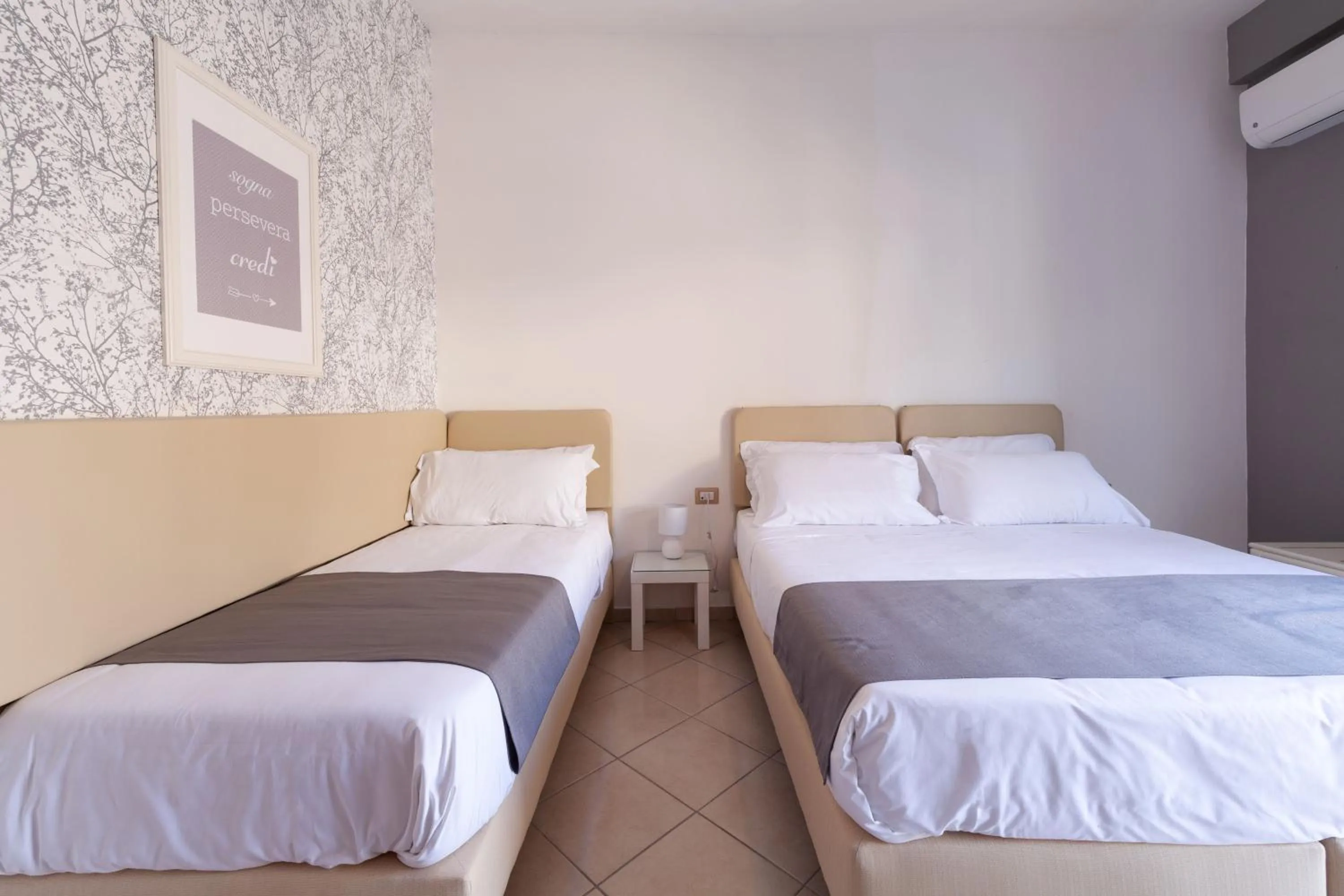 Bed in Mini Hotel - Angolo Di Paradiso -
