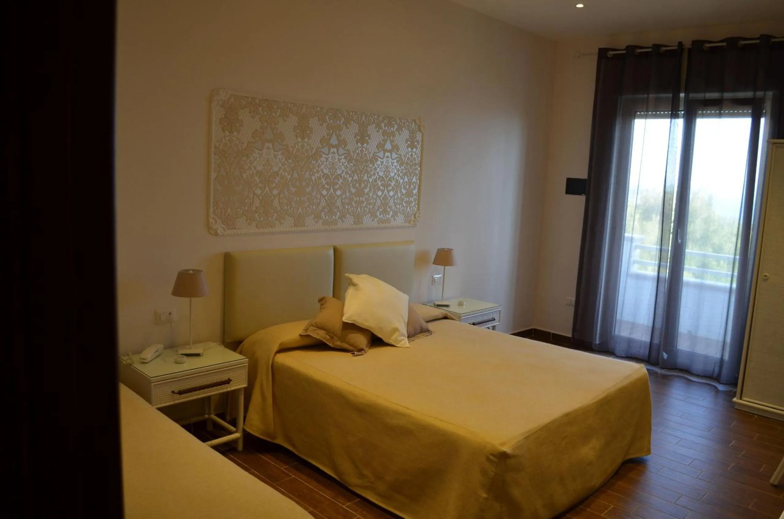 Photo of the whole room, Bed in Mini Hotel - Angolo Di Paradiso -