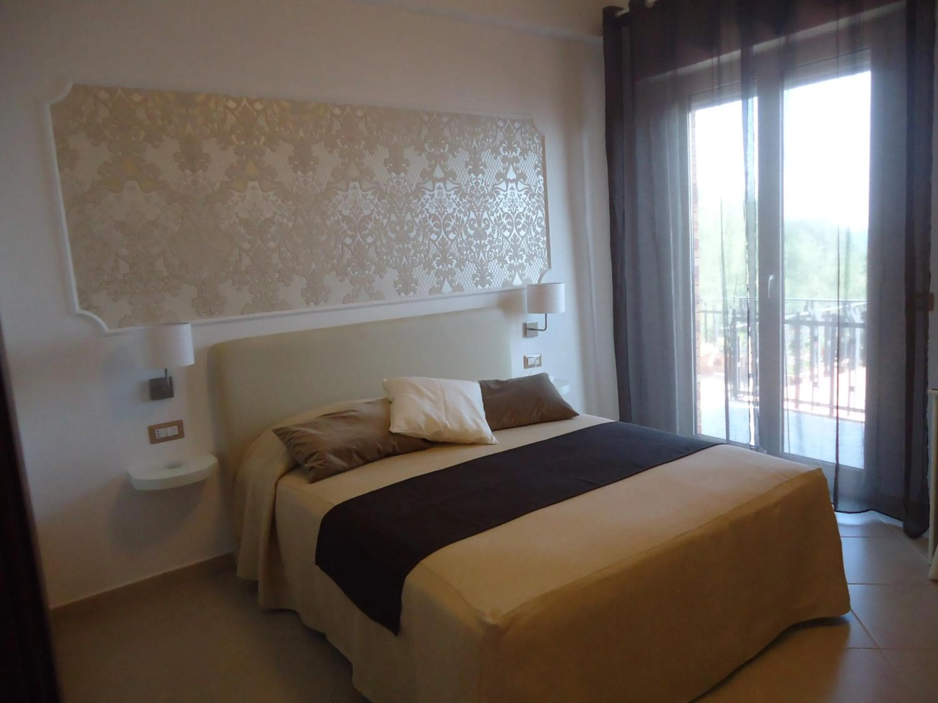 Photo of the whole room, Bed in Mini Hotel - Angolo Di Paradiso -