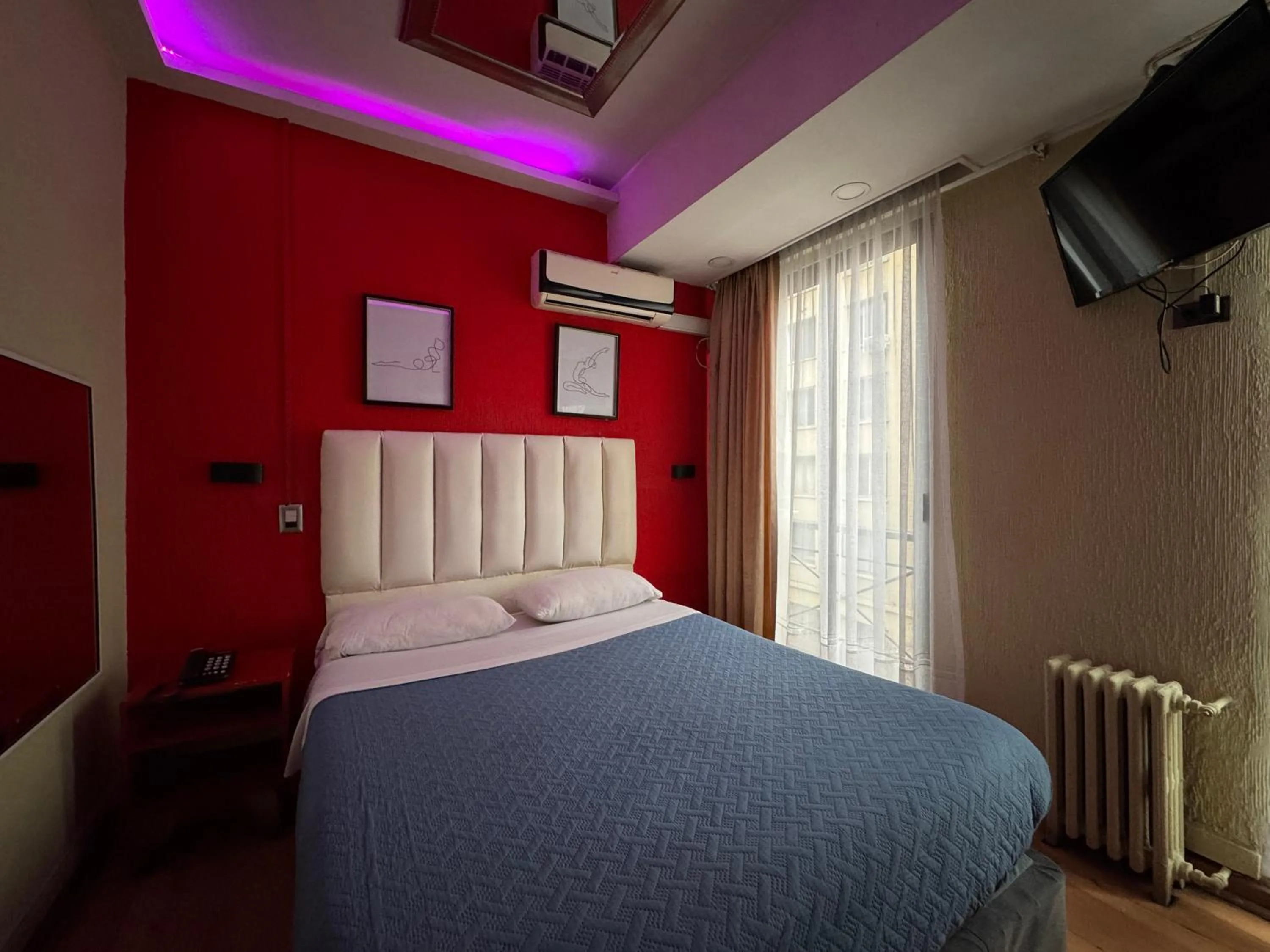 Bed in Intimo Hotel Miraflores