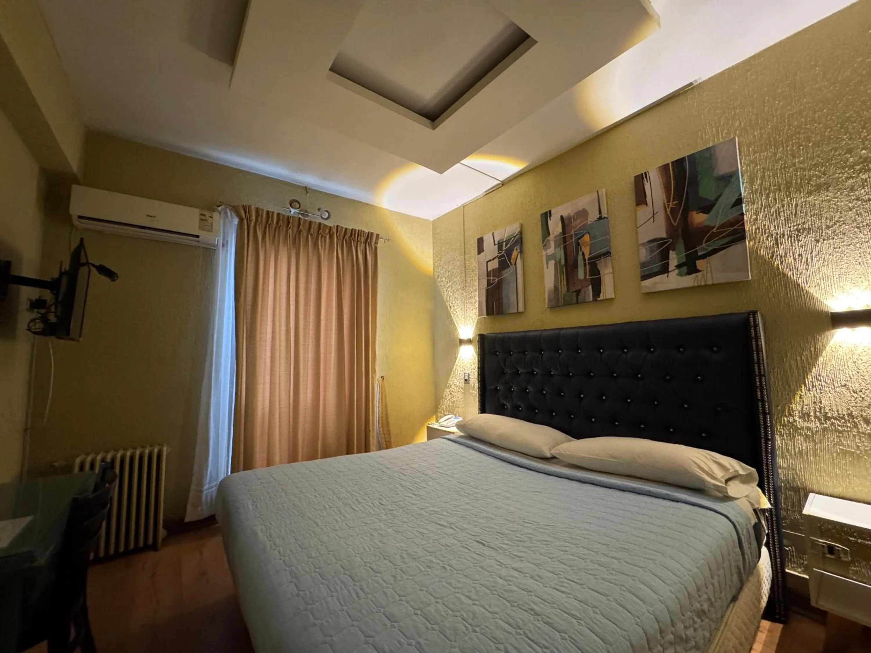 Bed in Intimo Hotel Miraflores