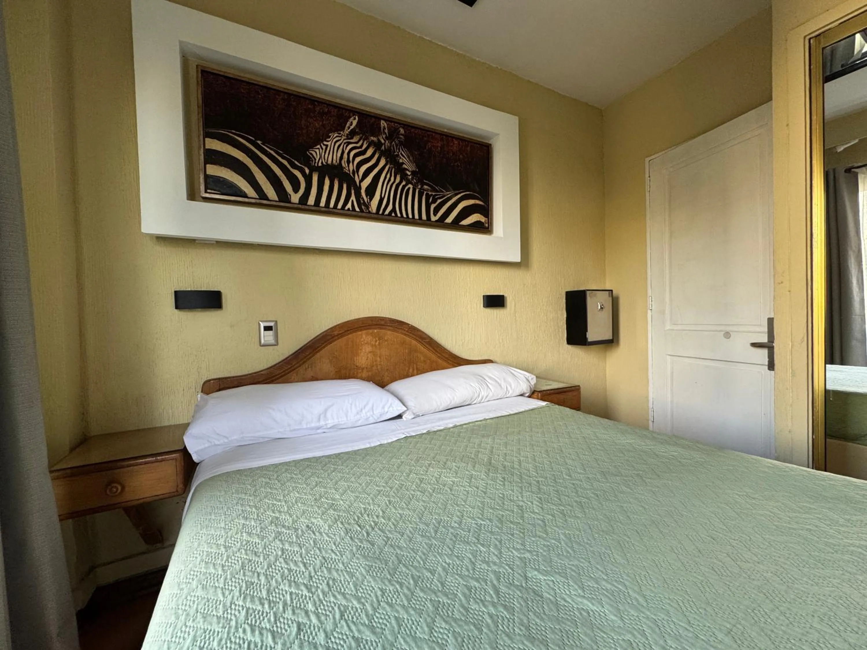 Bed in Intimo Hotel Miraflores