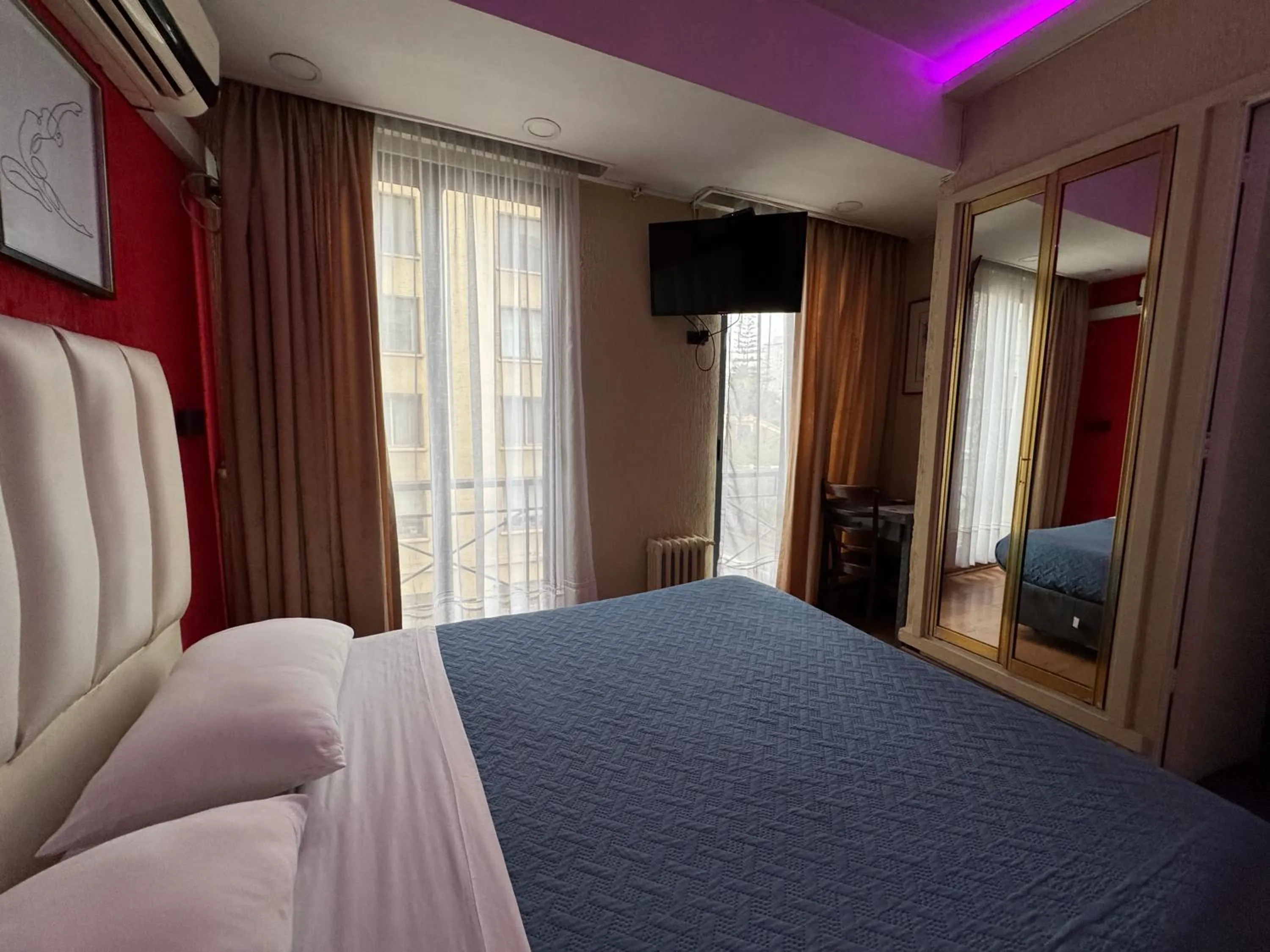 Bed in Intimo Hotel Miraflores