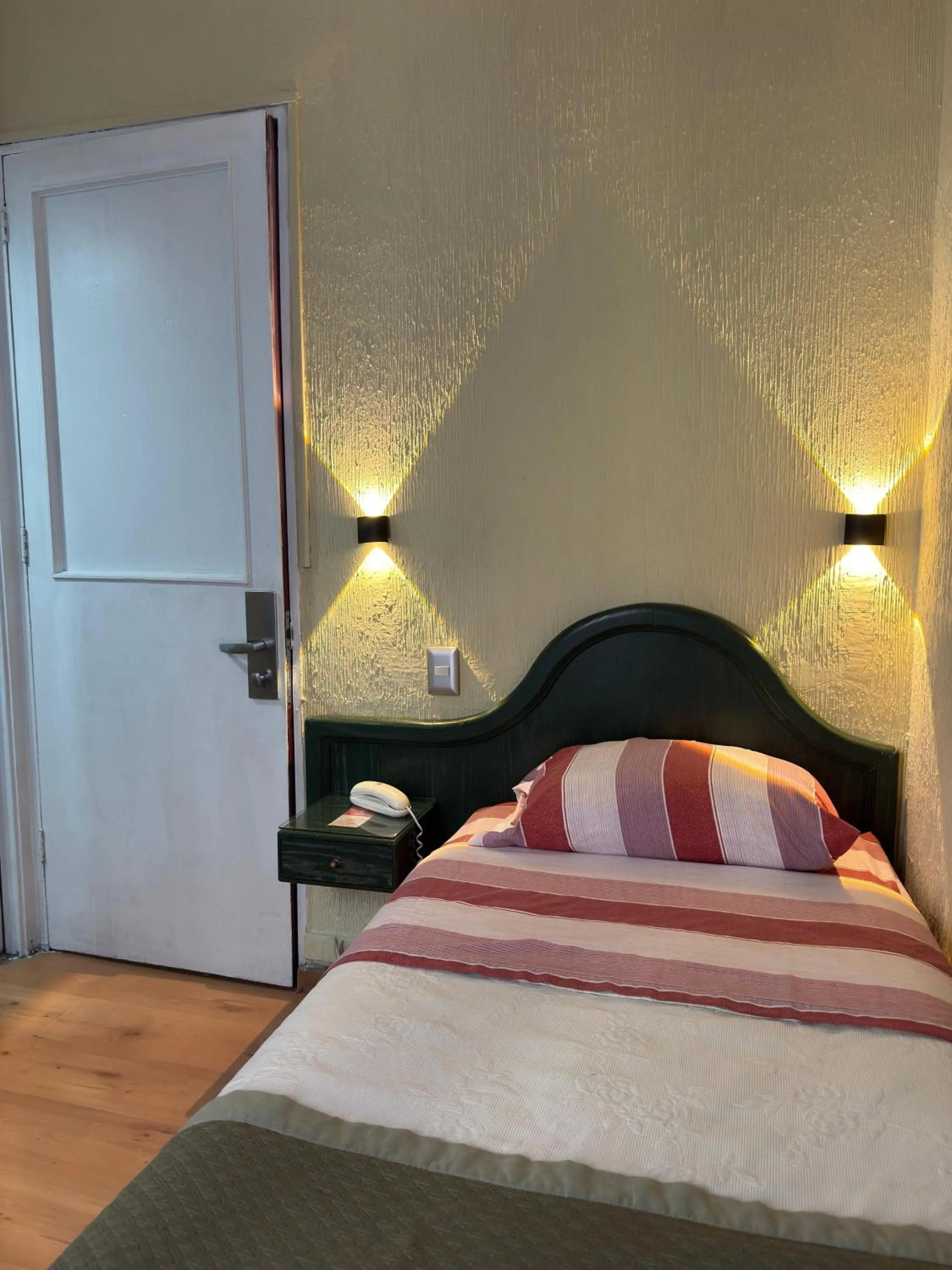 Bed in Intimo Hotel Miraflores