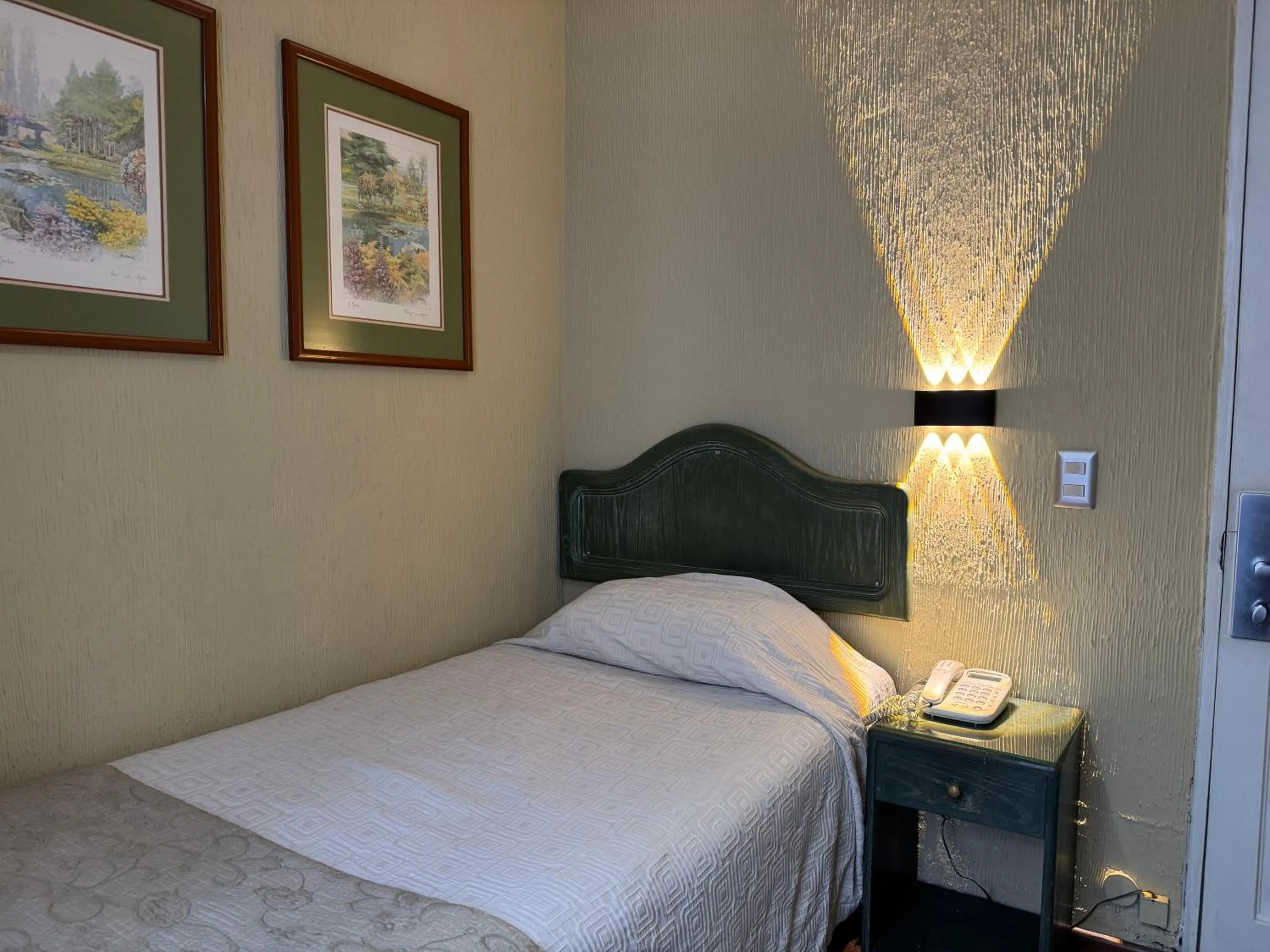 Bed in Intimo Hotel Miraflores