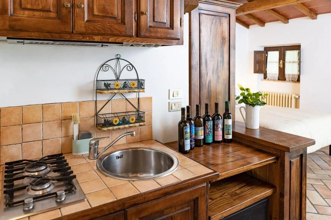 Kitchen or kitchenette in Agriturismo La Pievuccia