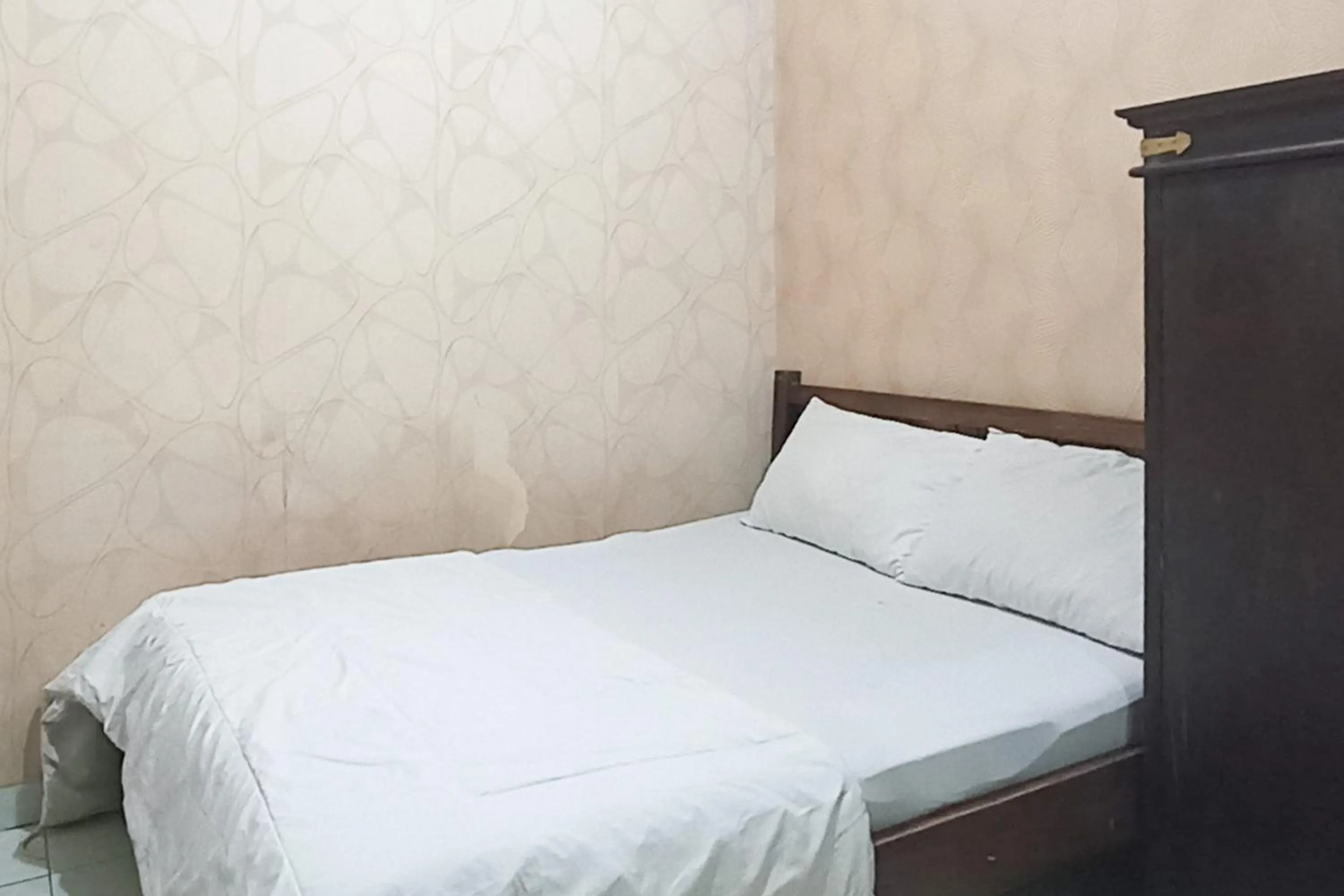 Bedroom, Bed in Trihakso Guest House near Kaliurang RedPartner