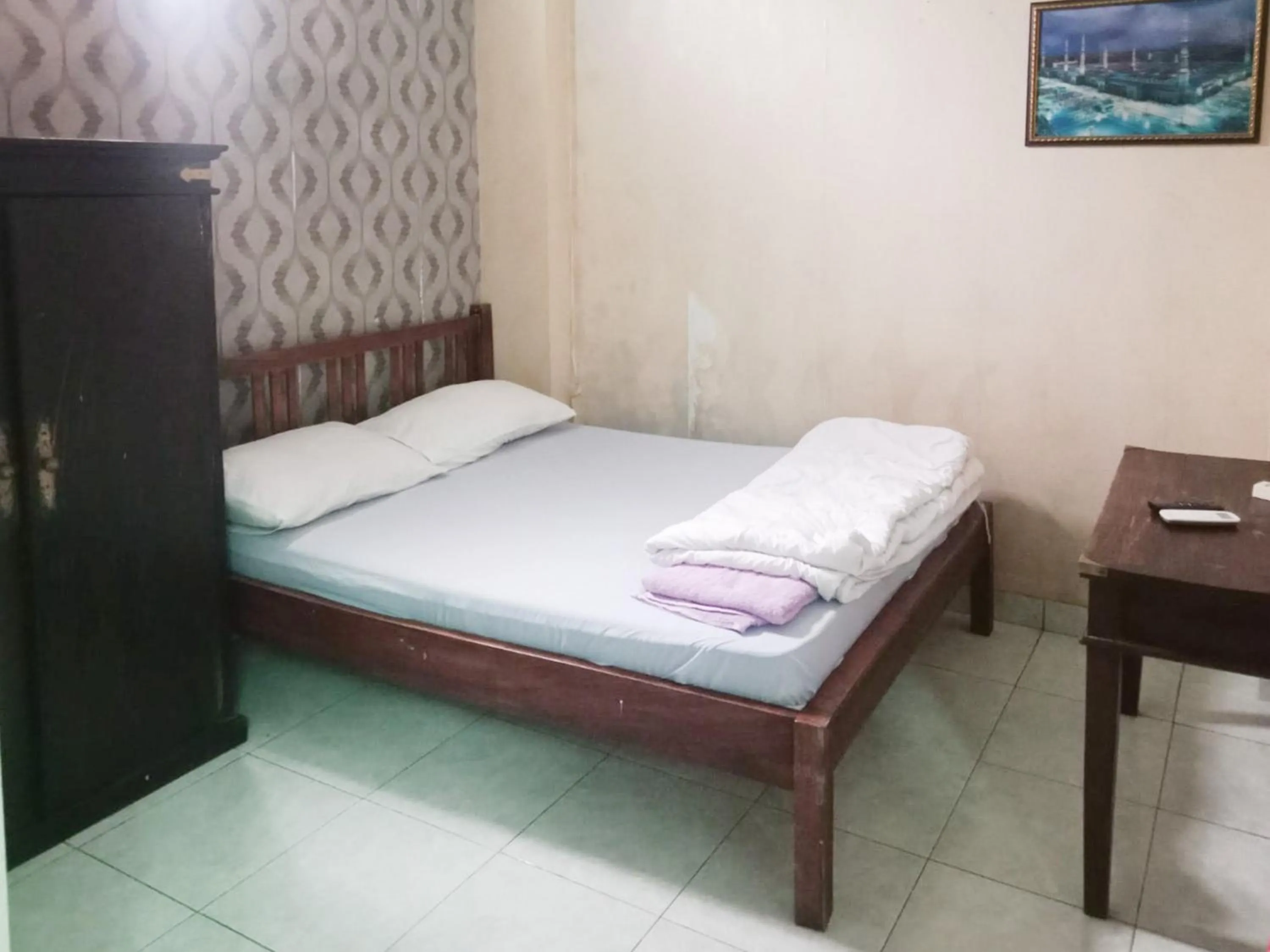 Bedroom, Bed in Trihakso Guest House near Kaliurang RedPartner
