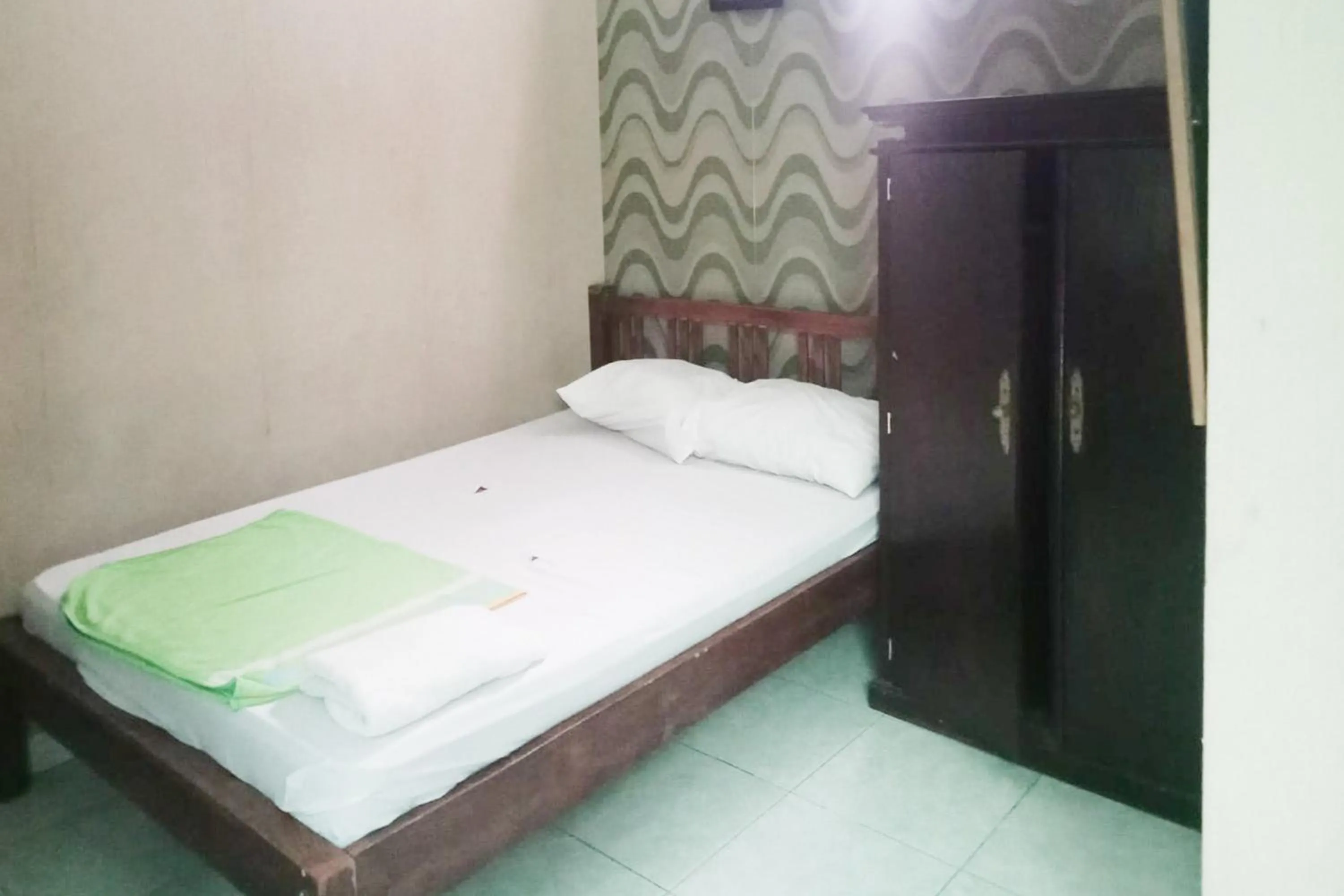 Bedroom, Bed in Trihakso Guest House near Kaliurang RedPartner