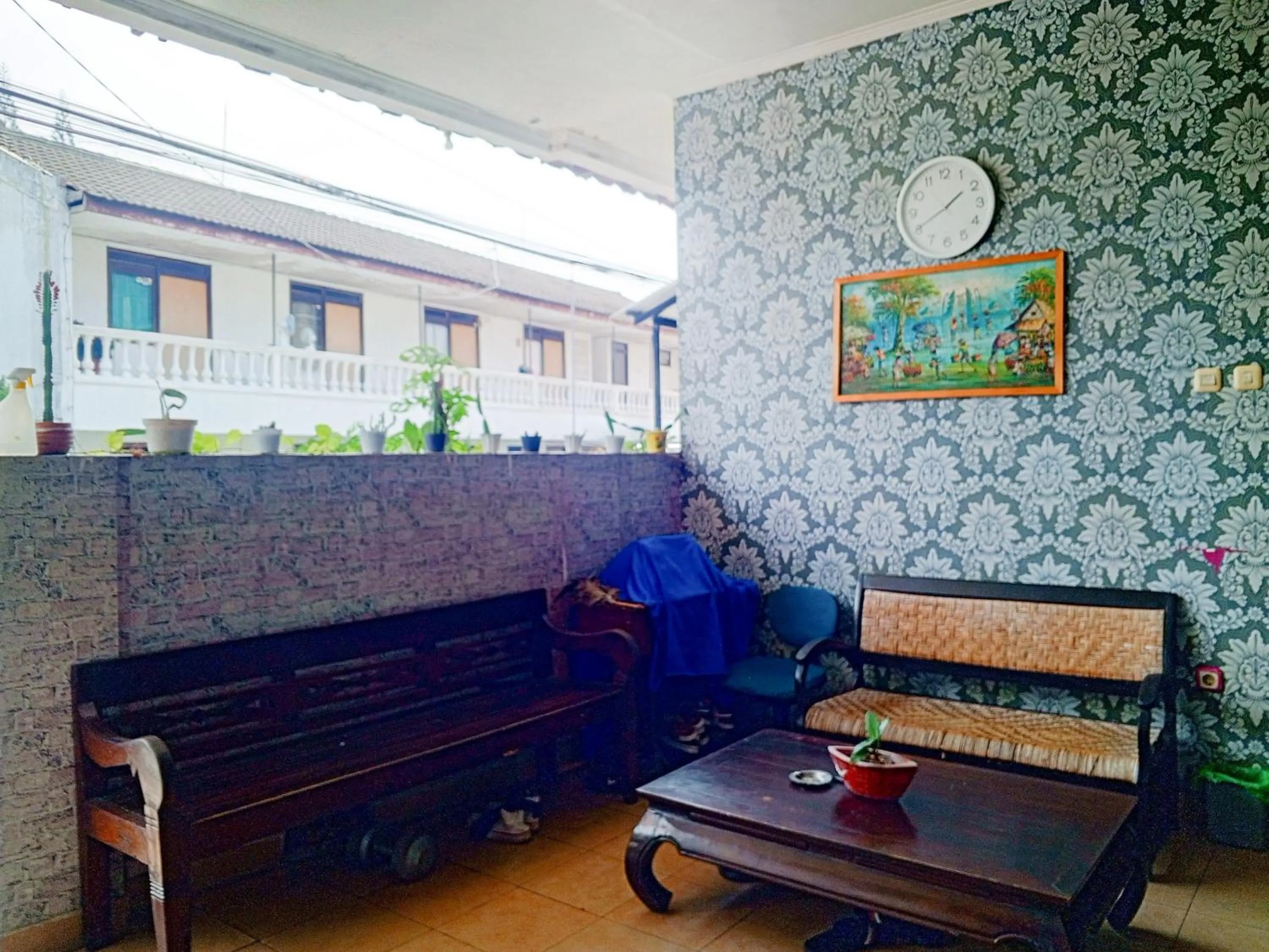 Seating area in Trihakso Guest House near Kaliurang RedPartner