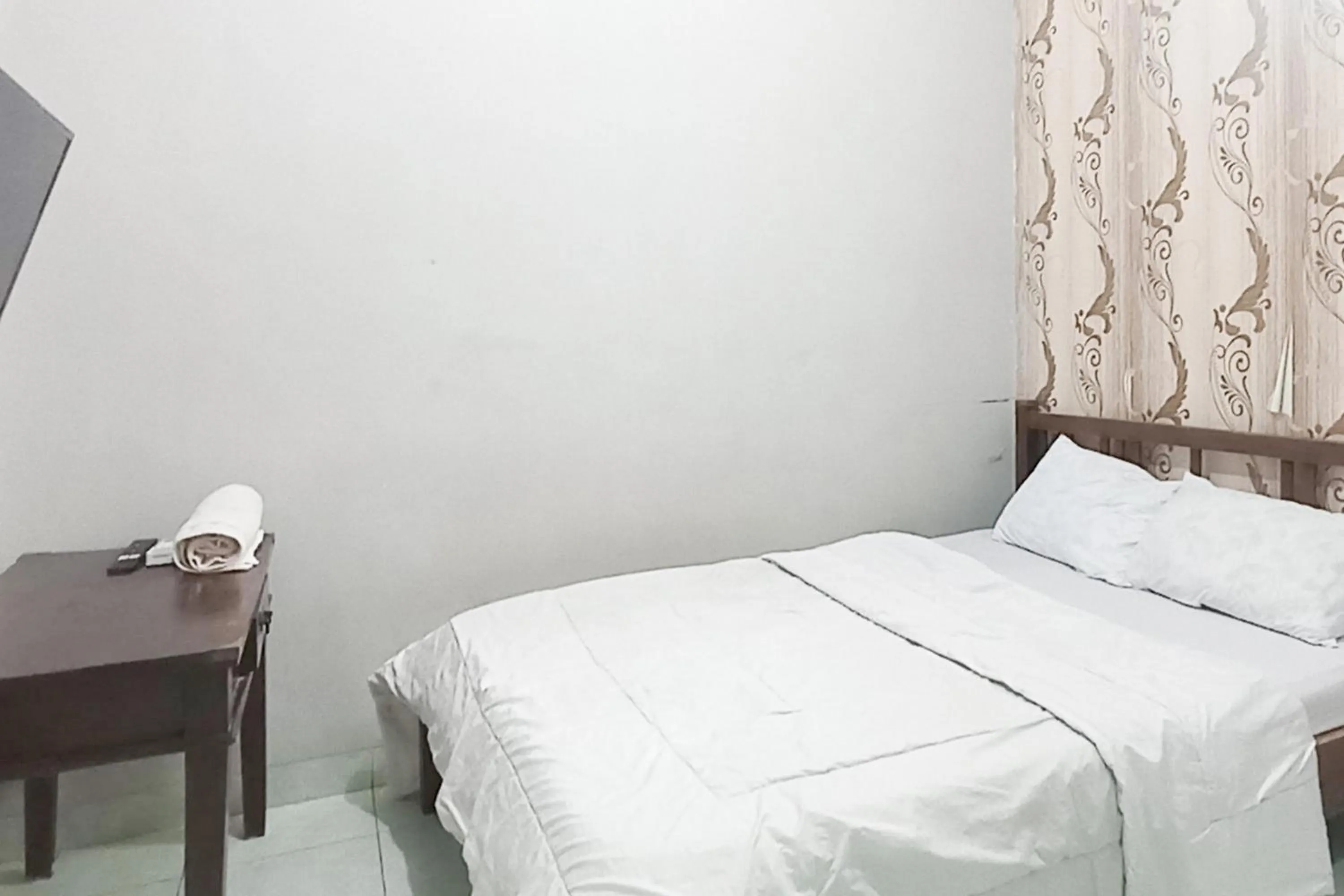 Bedroom, Bed in Trihakso Guest House near Kaliurang RedPartner