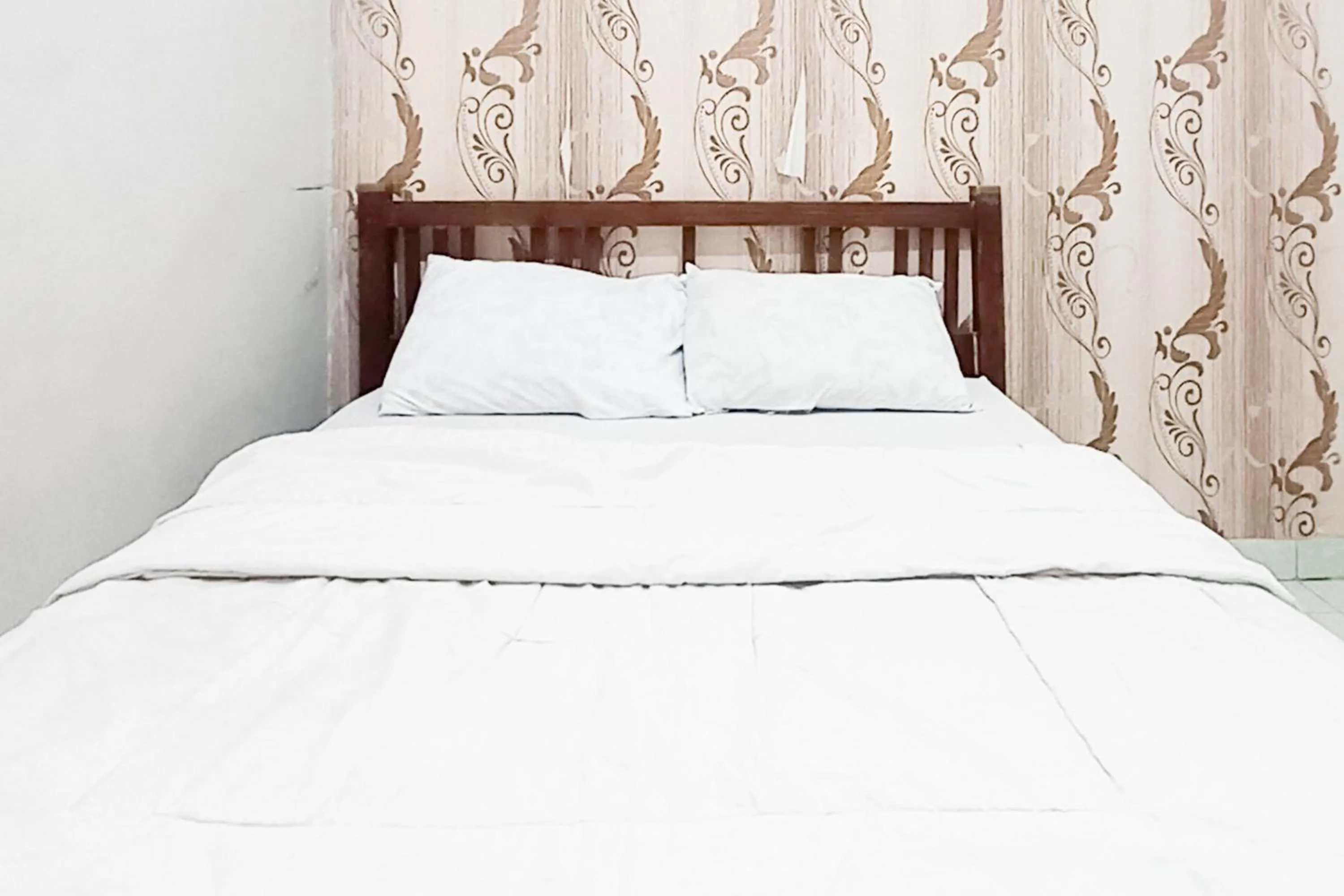 Bedroom, Bed in Trihakso Guest House near Kaliurang RedPartner