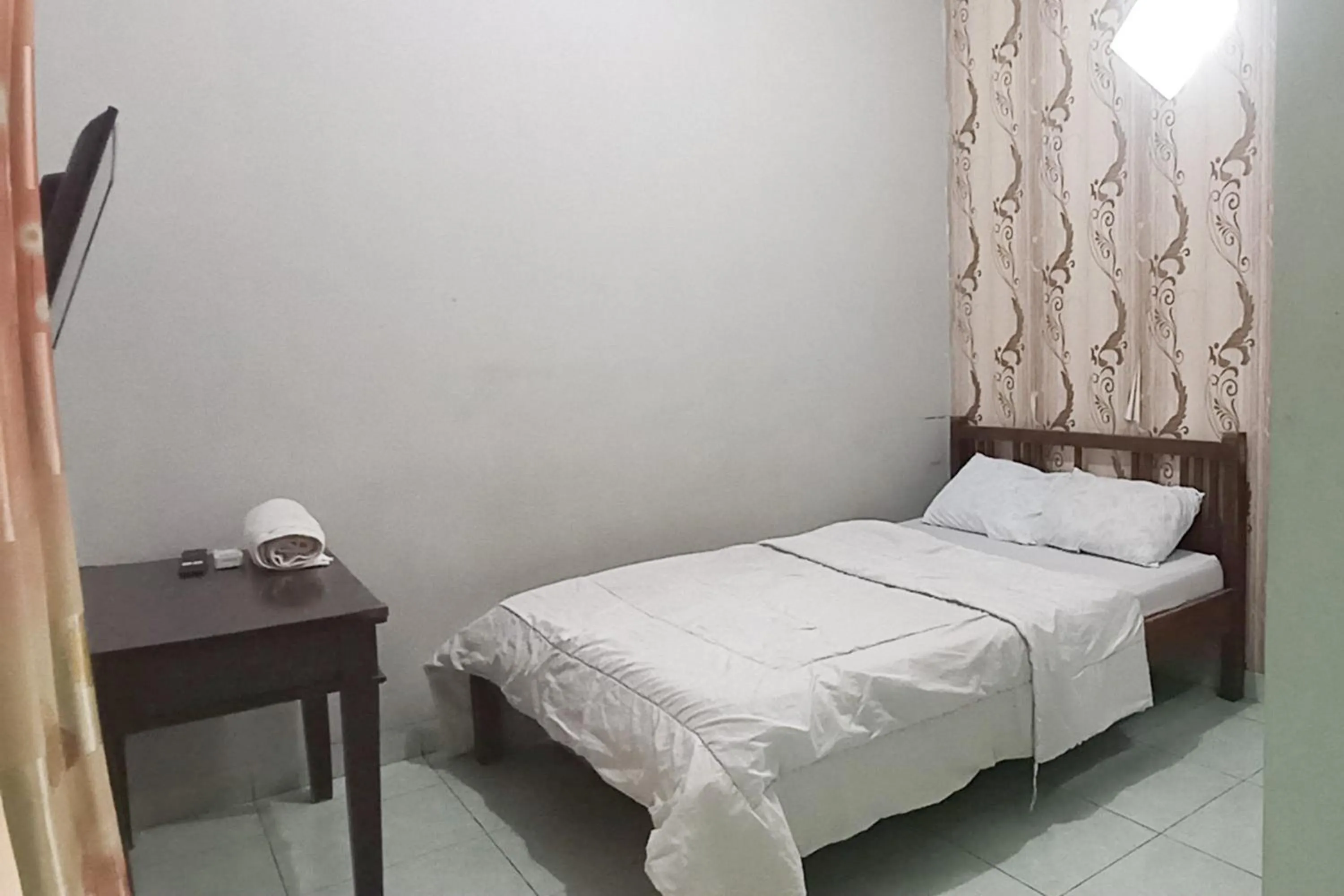 Bedroom, Bed in Trihakso Guest House near Kaliurang RedPartner