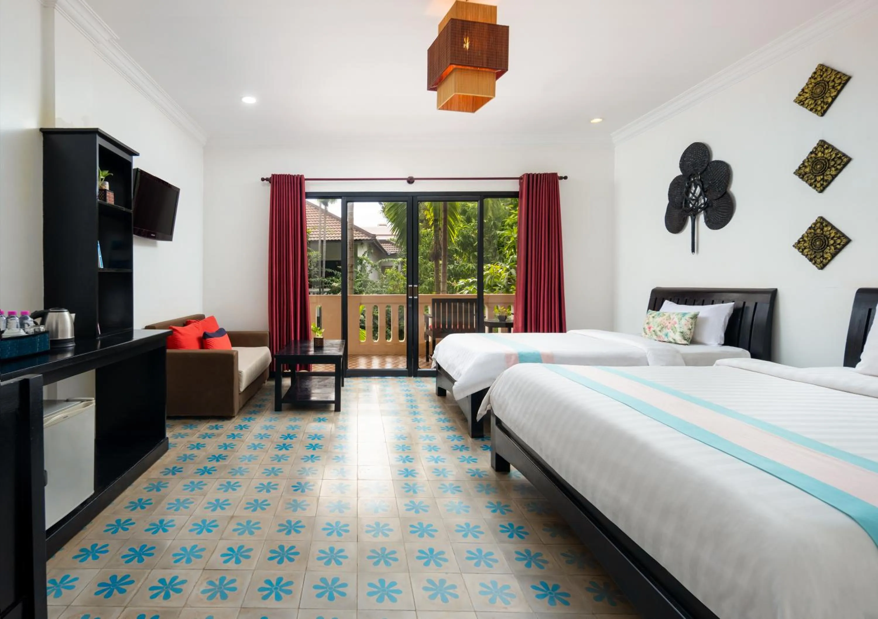 Bed in La Residence WatBo Hotel