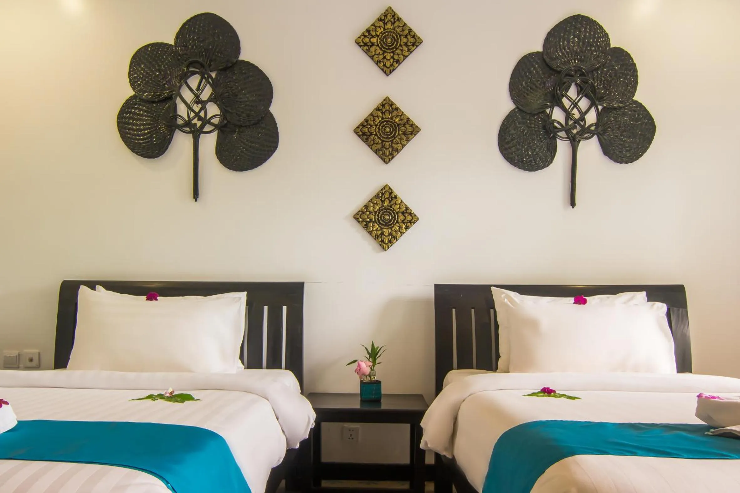 Bed in La Residence WatBo Hotel