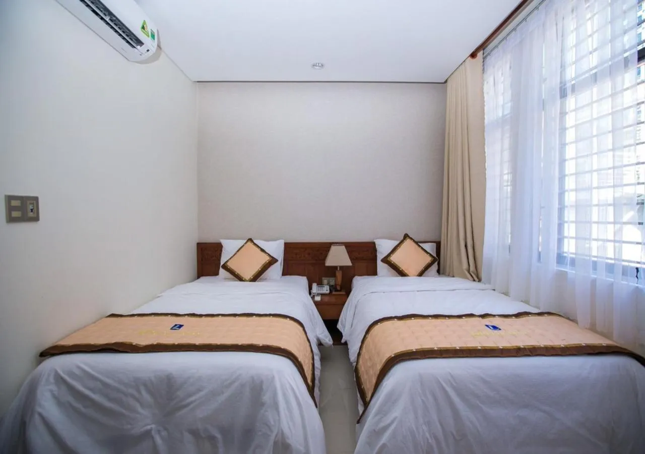 Bed in Liberty Hotel Đà Nẵng