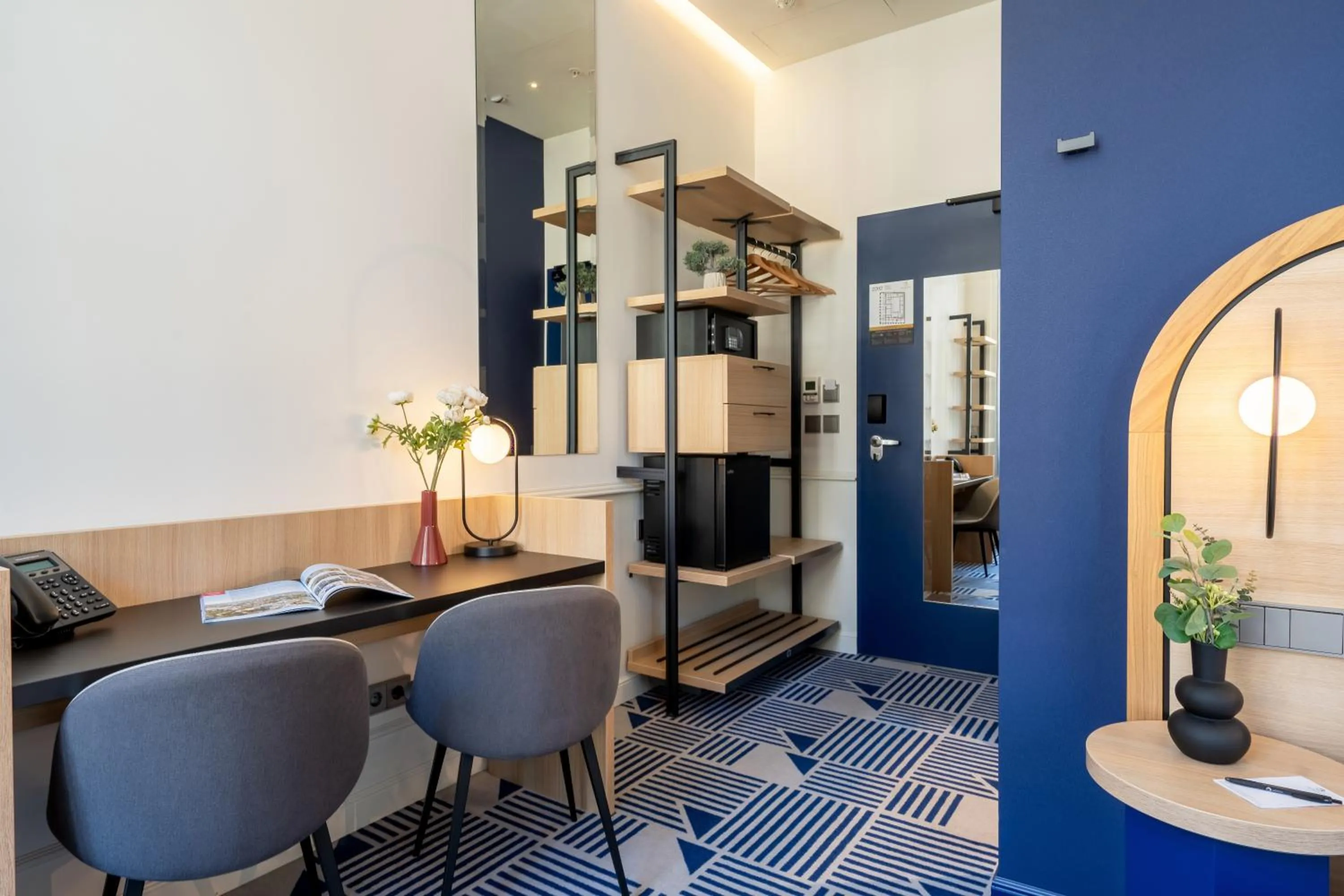 Seating area in Hotel Oktogon Haggenmacher by Continental Group