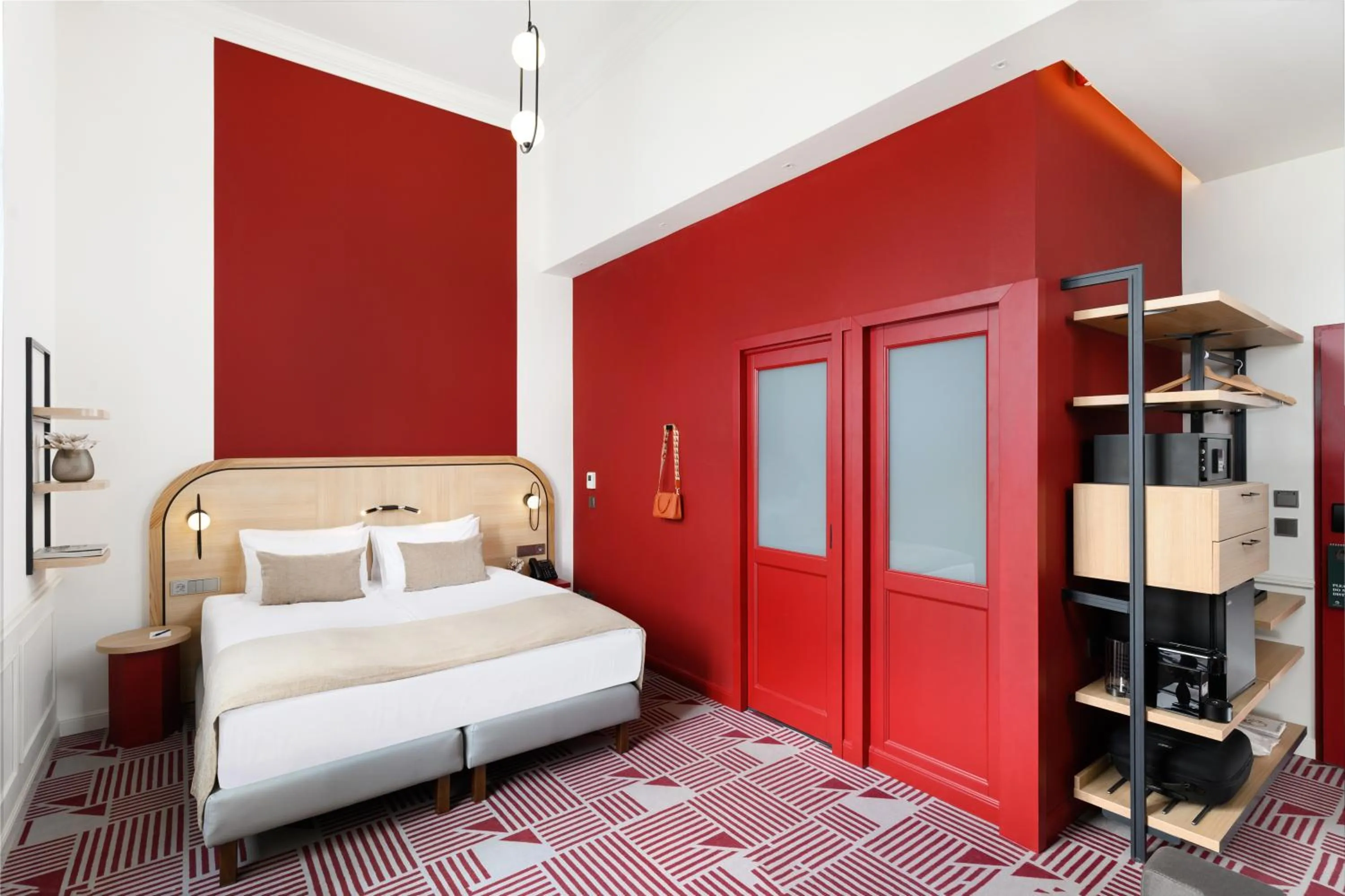 Bed in Hotel Oktogon Haggenmacher by Continental Group