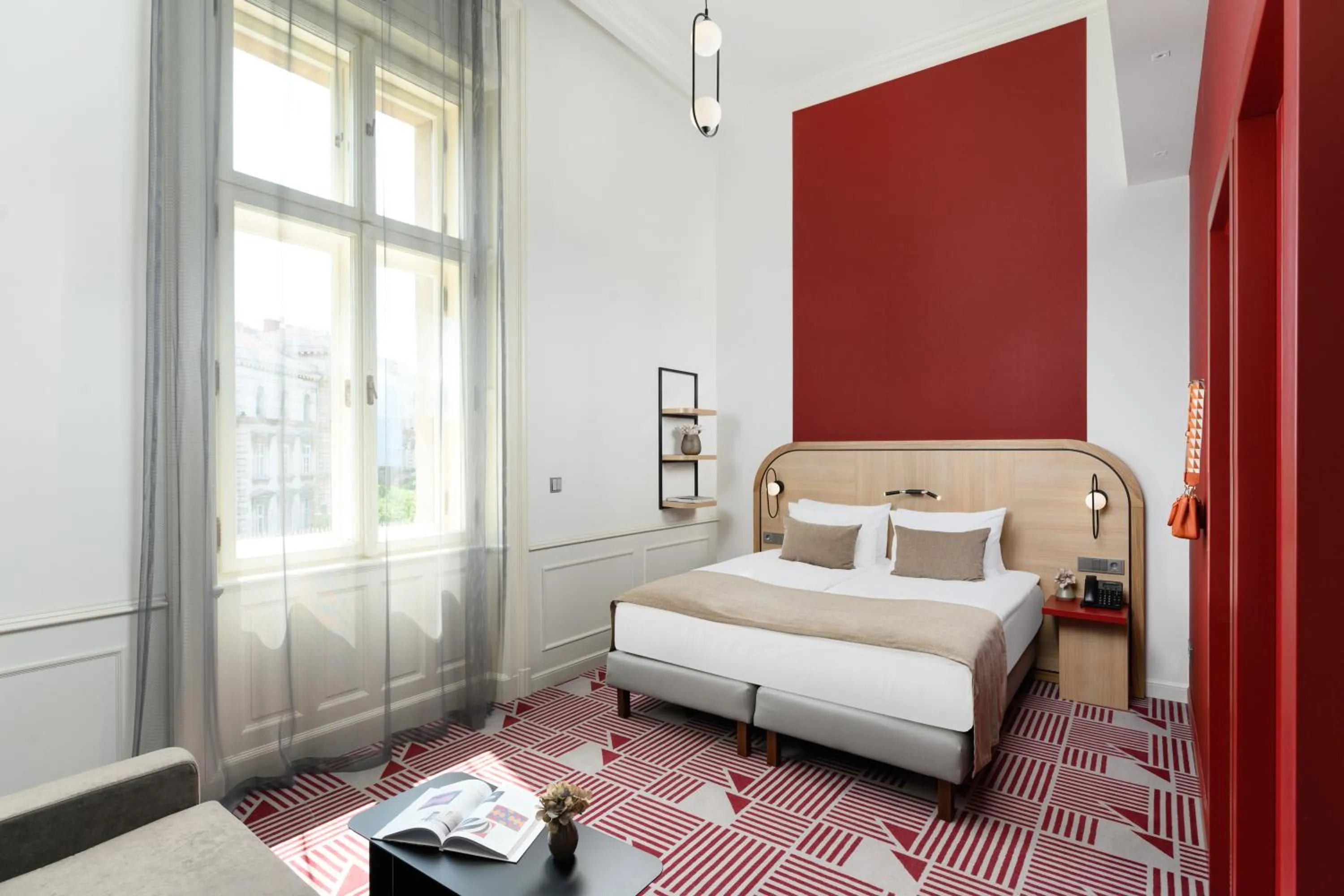 Bed in Hotel Oktogon Haggenmacher by Continental Group