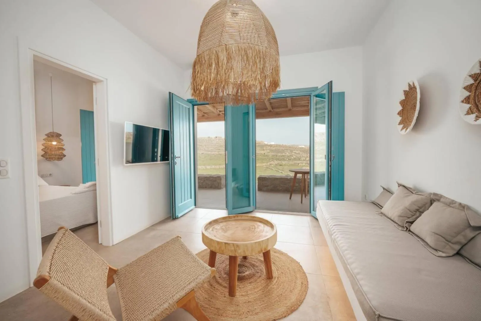Seating area, Bed in Anemela Villas & Suites Mykonos