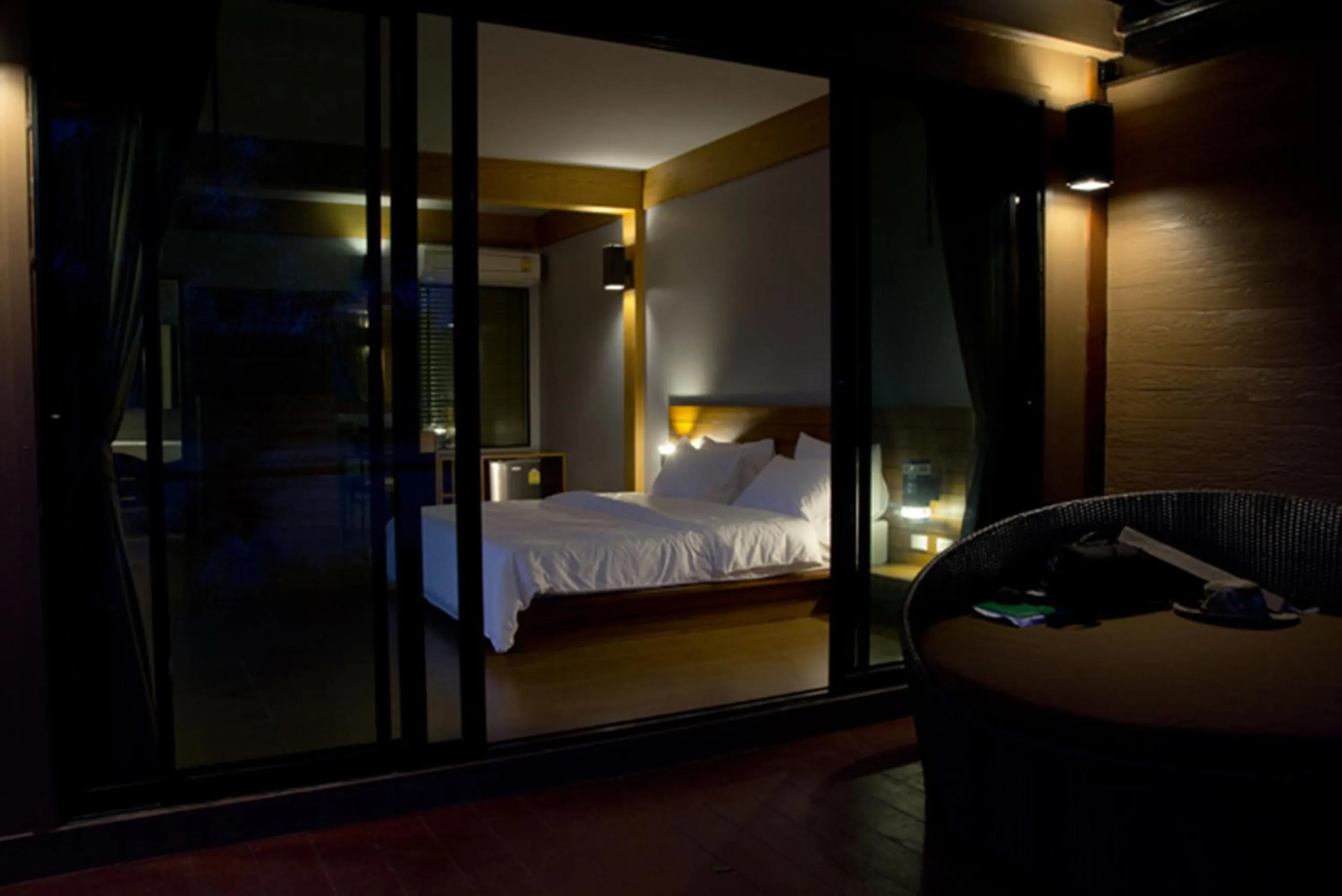 Bed in The Grace Amphawa