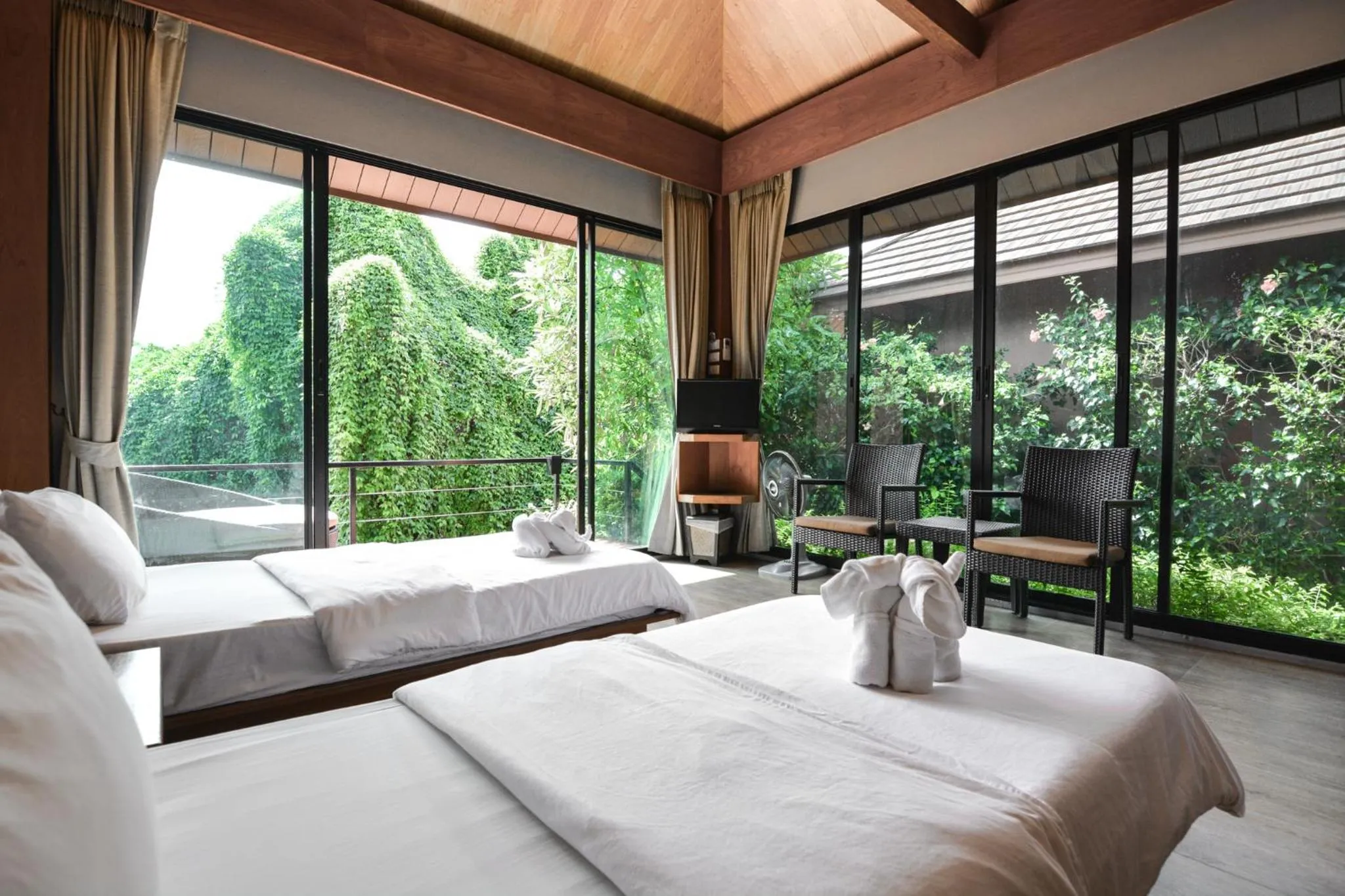 Photo of the whole room, Bed in The Grace Amphawa