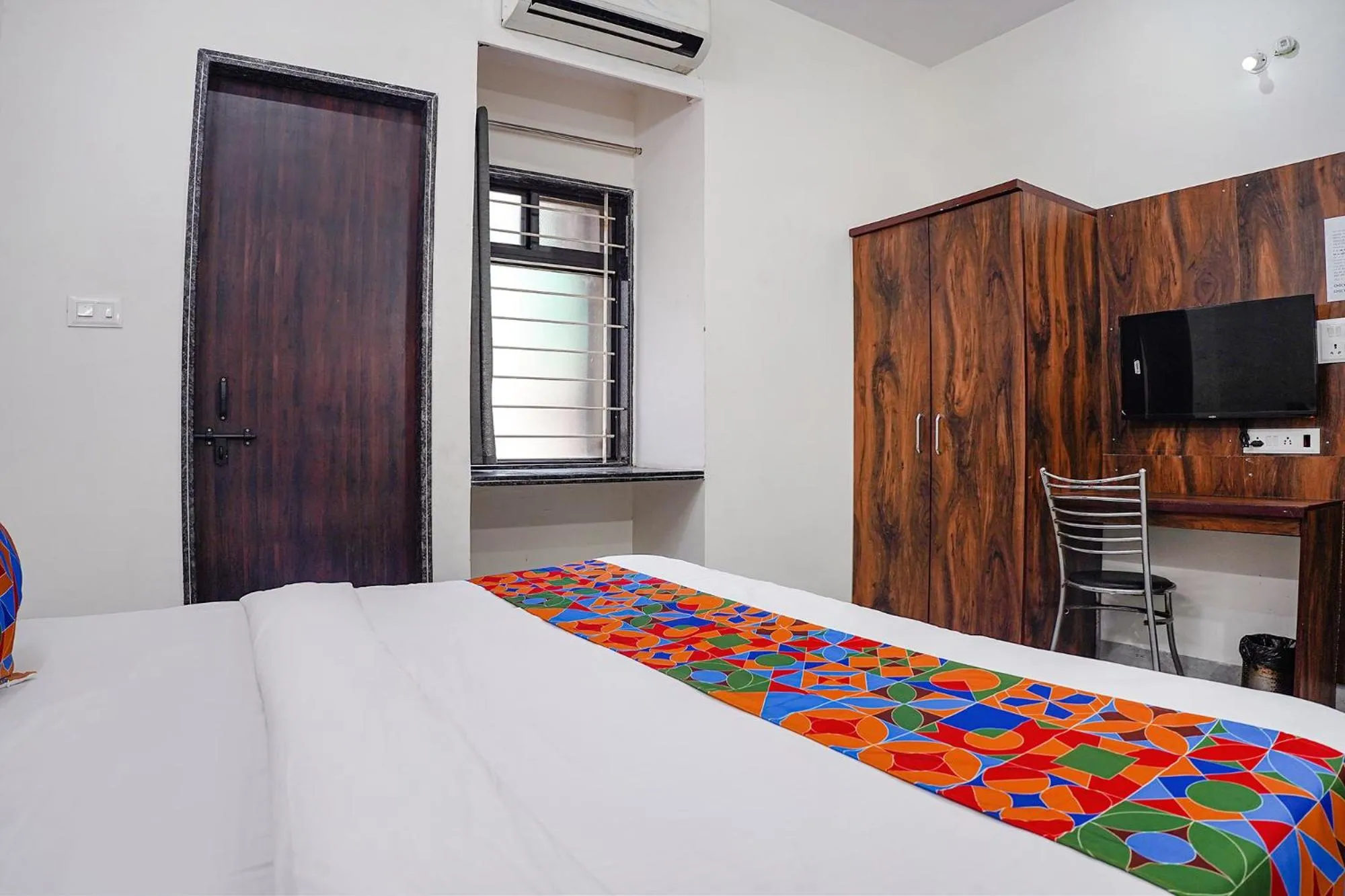 Bedroom, Bed in FabHotel SSG