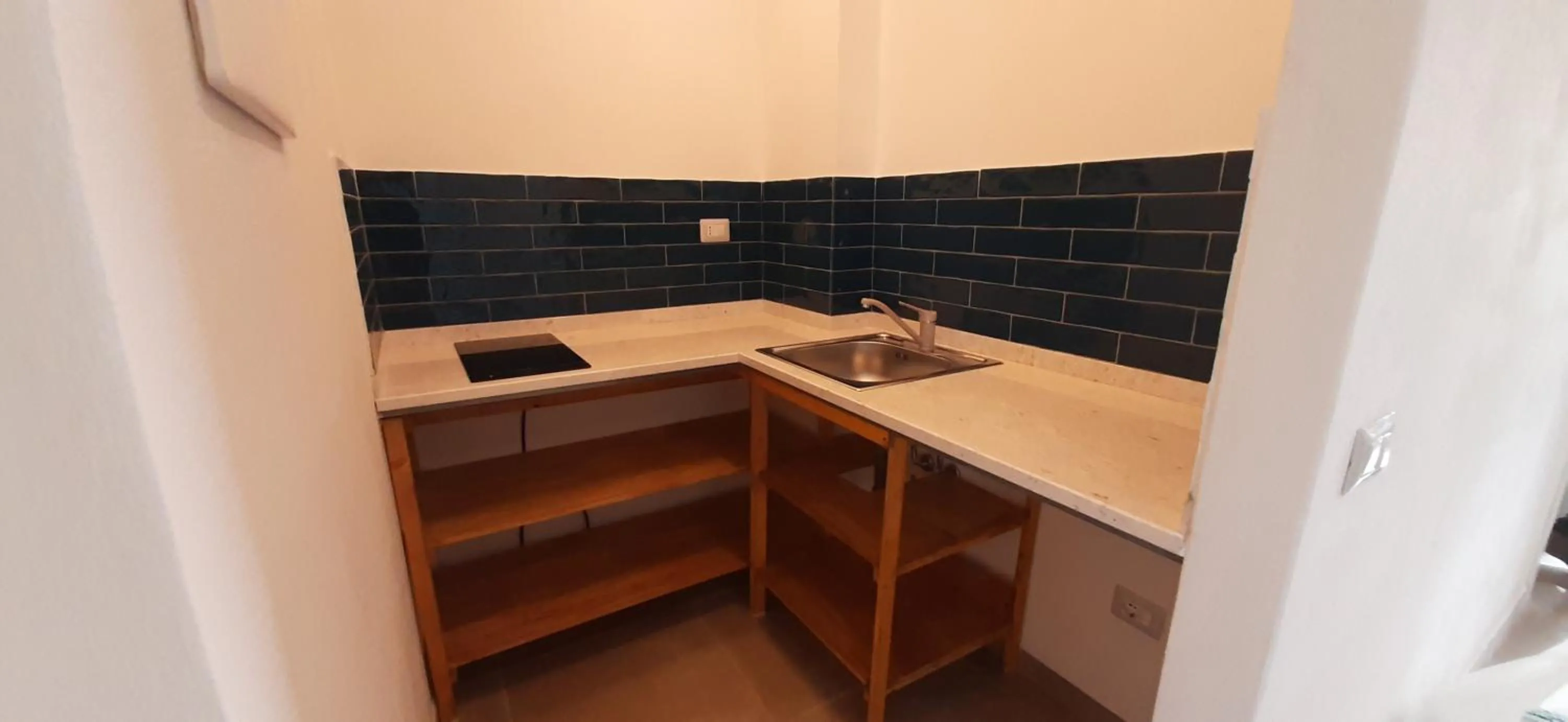 Kitchen or kitchenette in Lispusada Agriturismo Adults Only