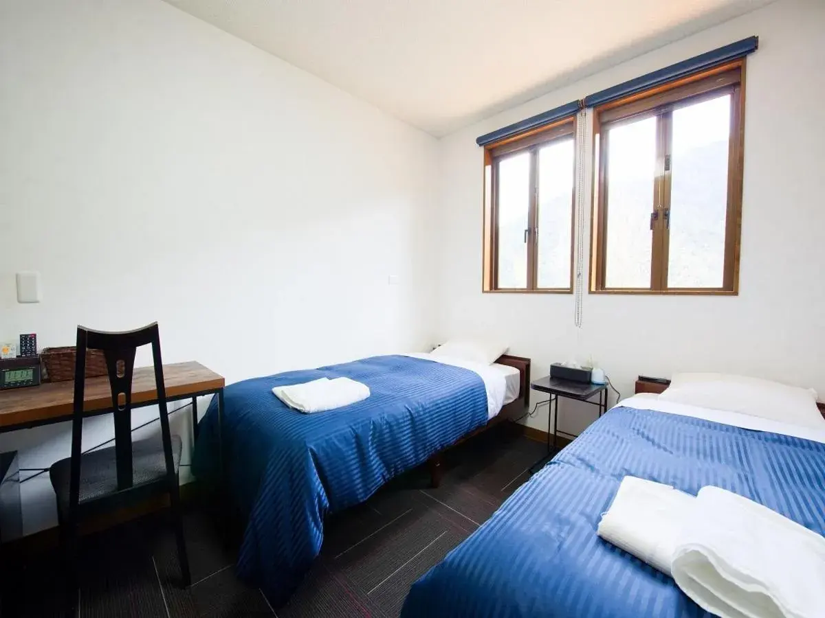 Photo of the whole room, Bed in TABIHAKU STAY 香住 Photo of the whole room, Bed in TABIHAKU STAY 香住
