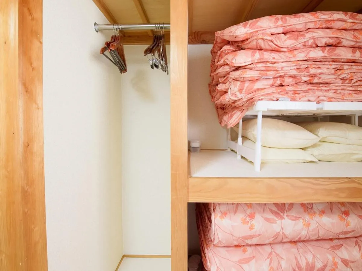 Bed in TABIHAKU STAY 香住