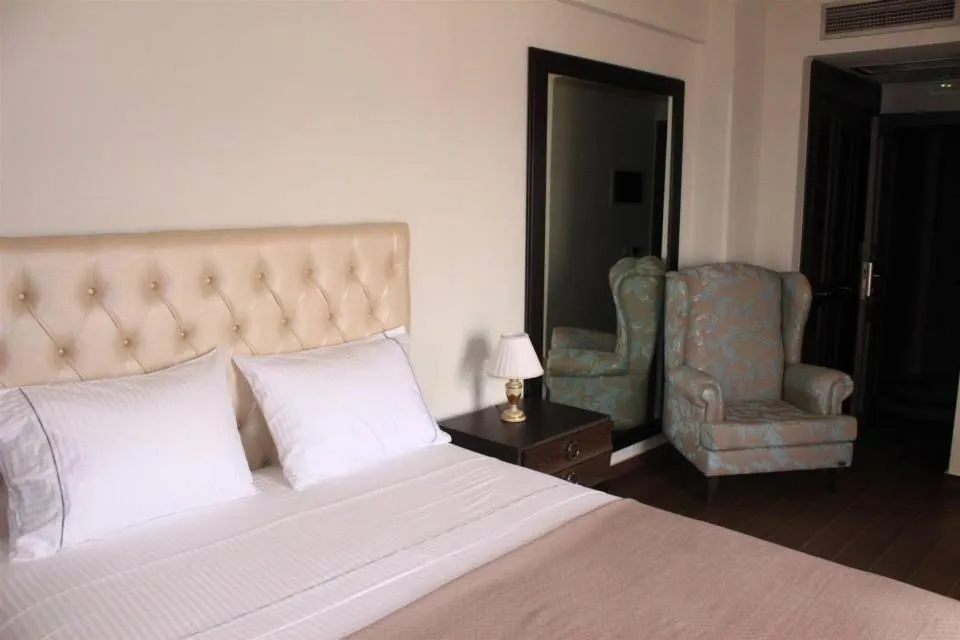 Bed in Theasis Hotel Paramythia