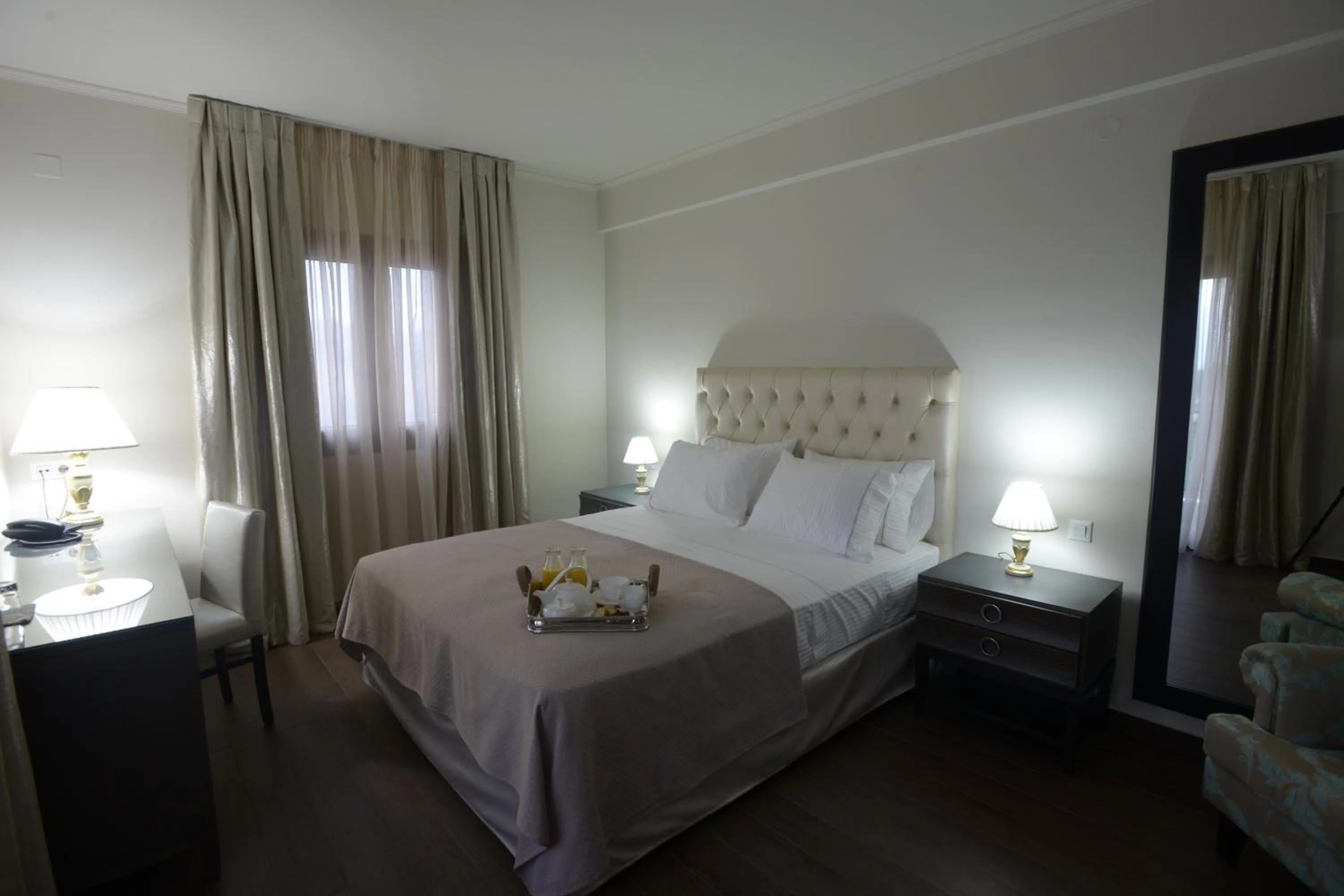 Bed in Theasis Hotel Paramythia