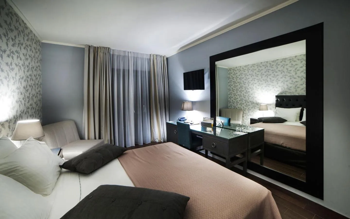 Bed in Theasis Hotel Paramythia