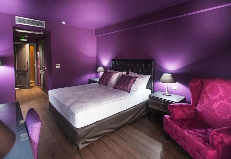 Bed in Theasis Hotel Paramythia