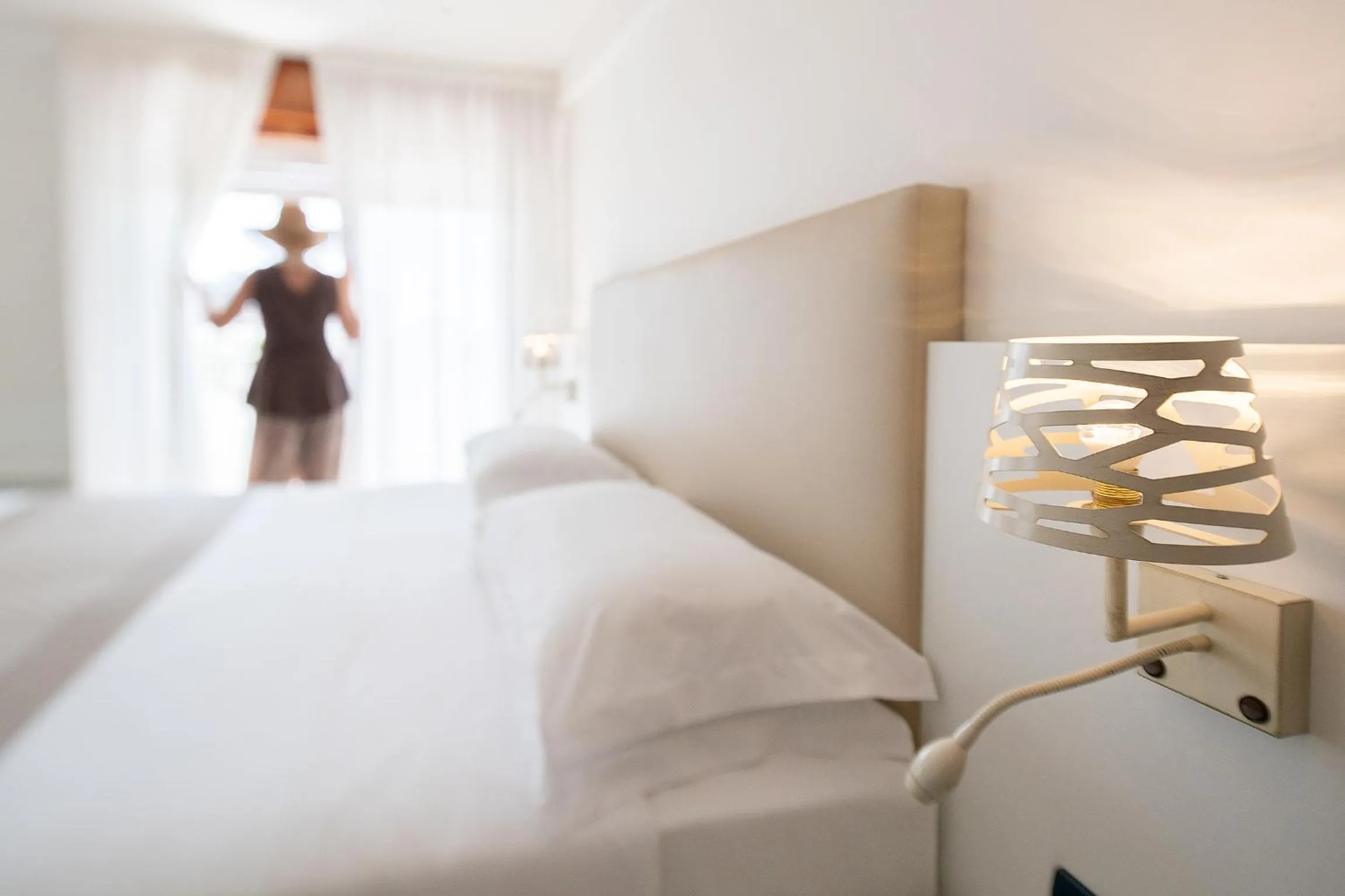 Bed in Fantinello Hotel